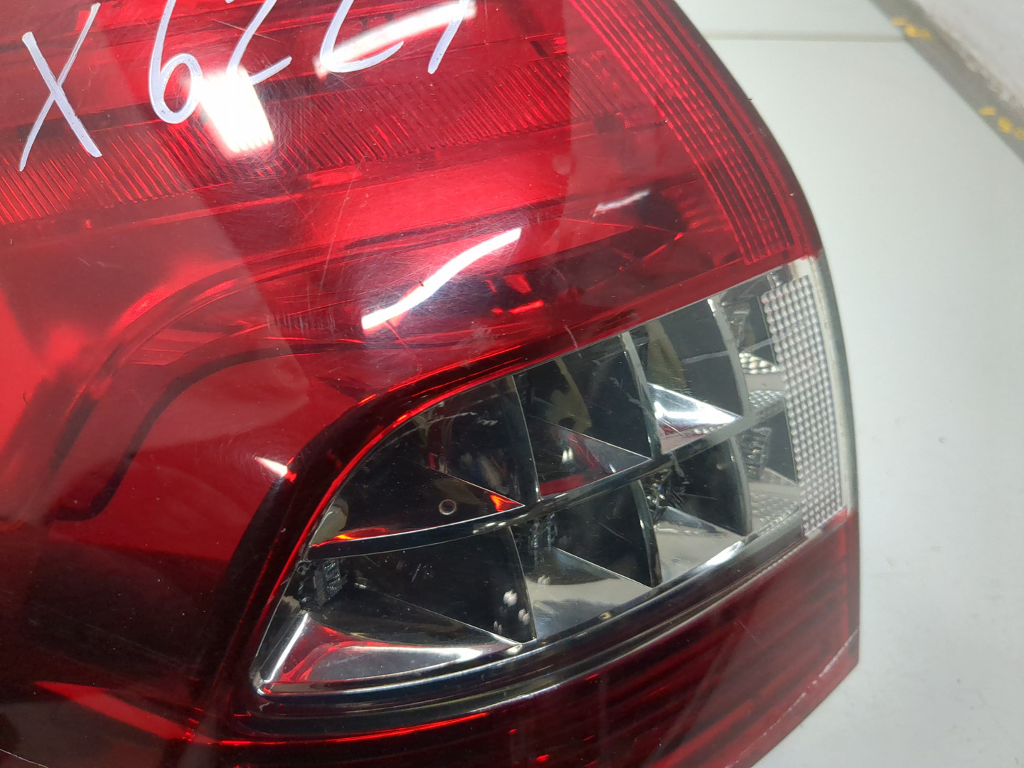 Фонарь задний левый