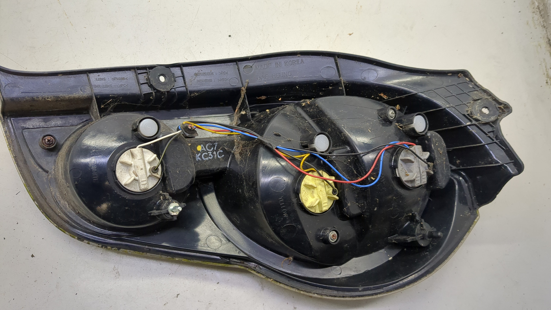 Фонарь задний левый