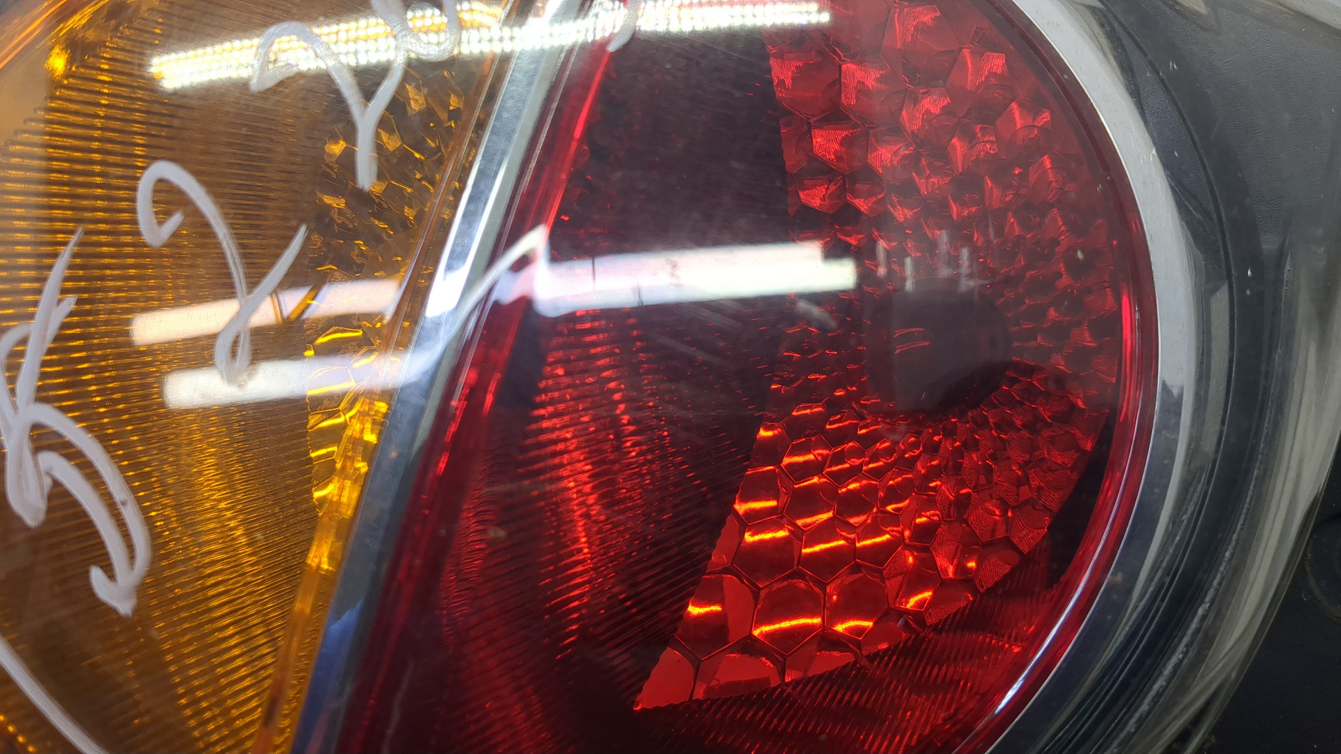 Фонарь задний левый