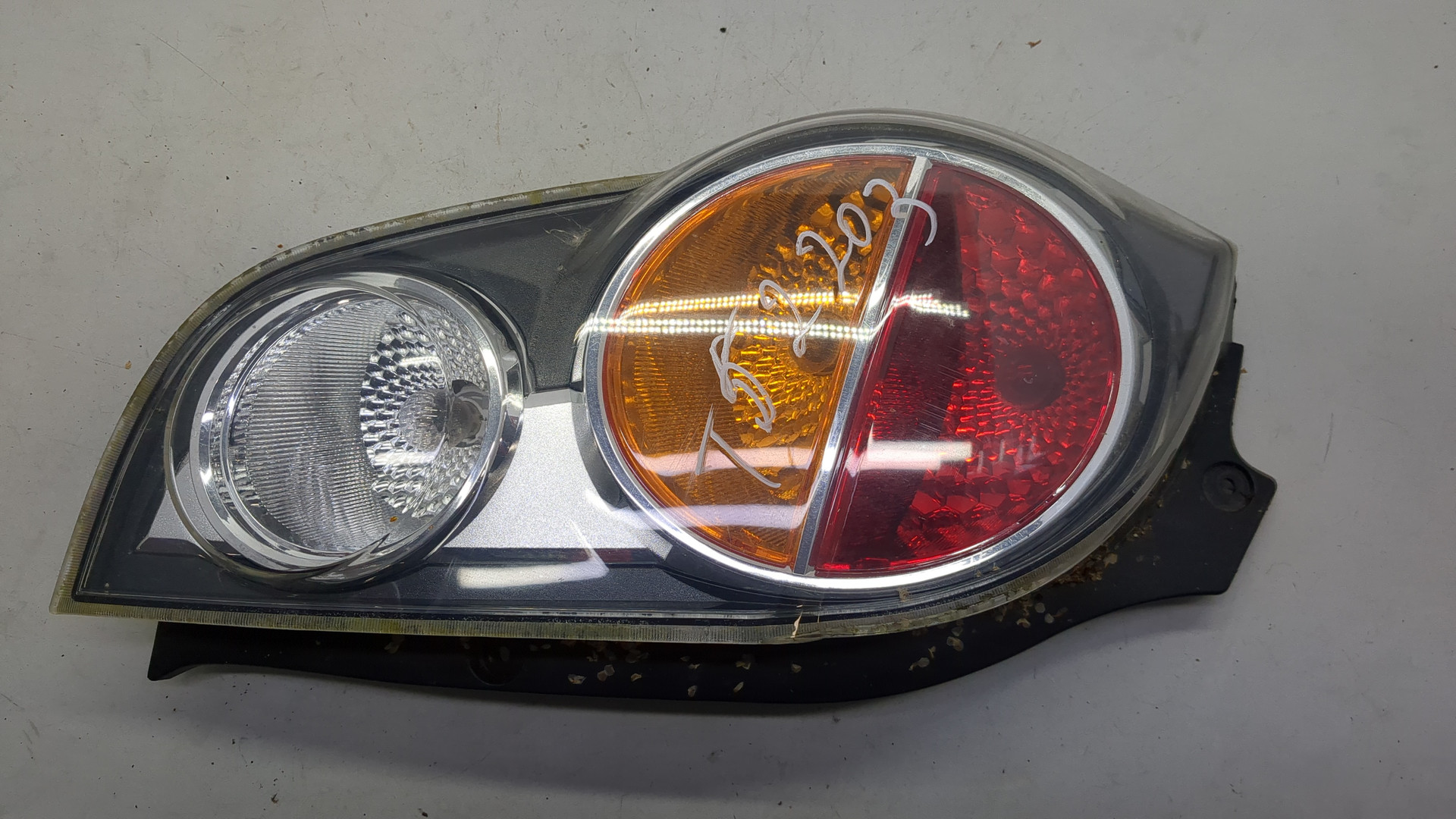 Фонарь задний левый