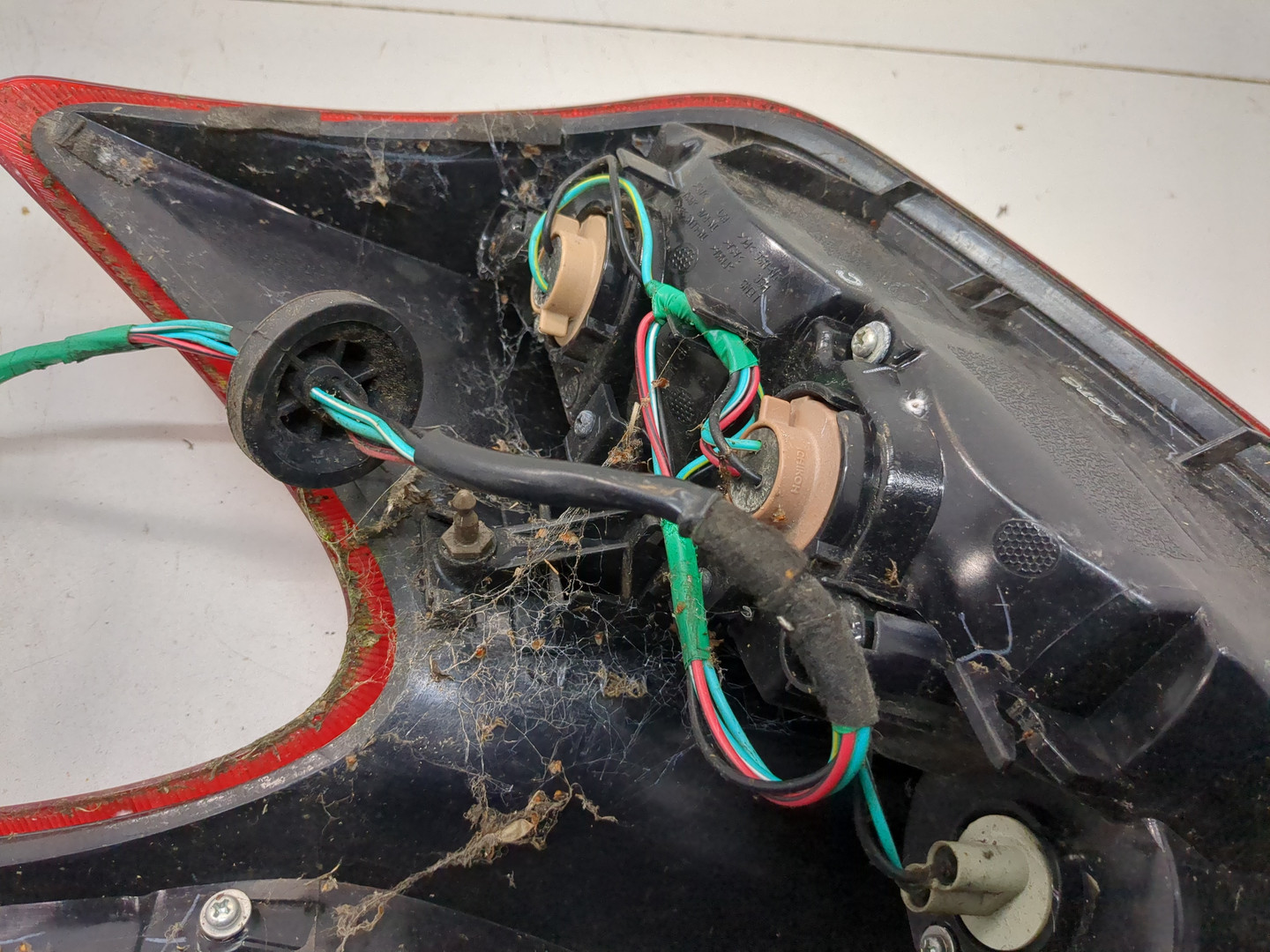 Фонарь задний левый