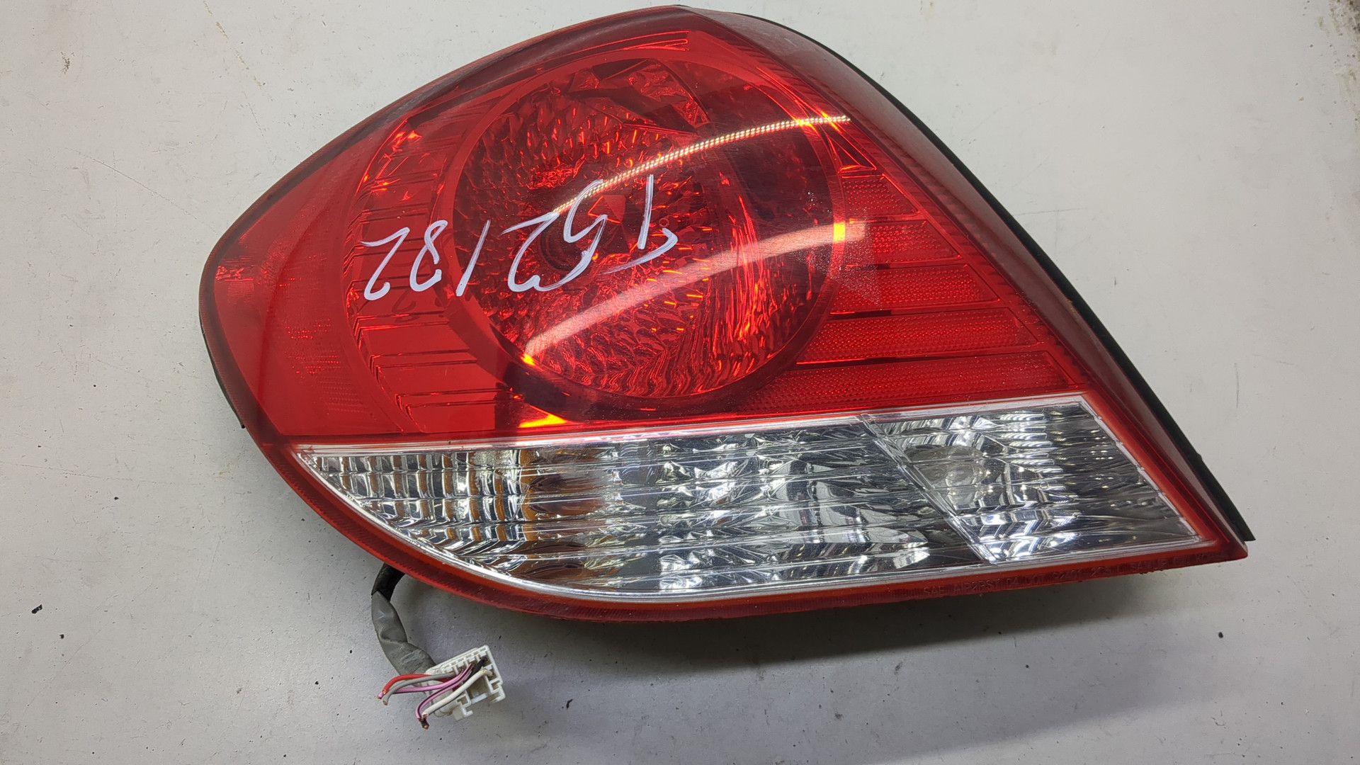 Фонарь задний левый