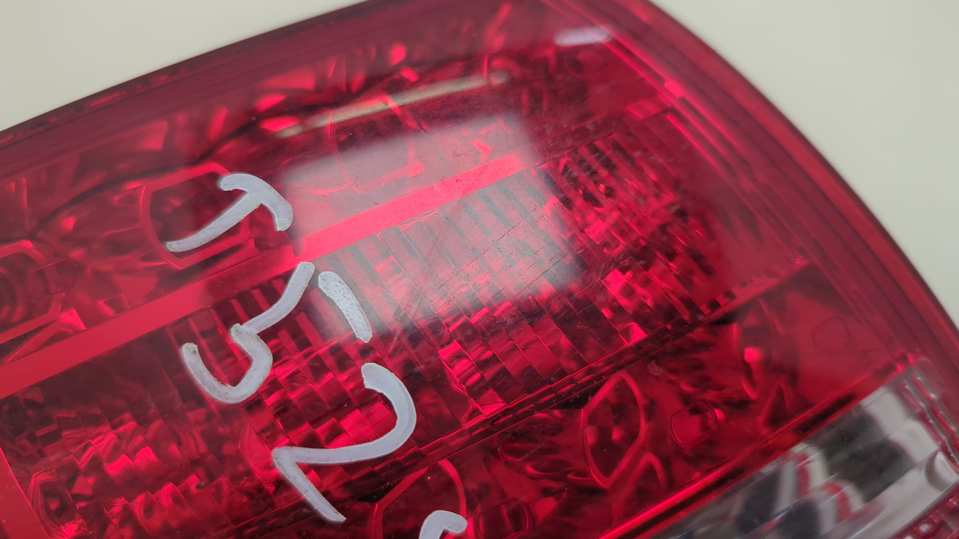 Фонарь задний левый