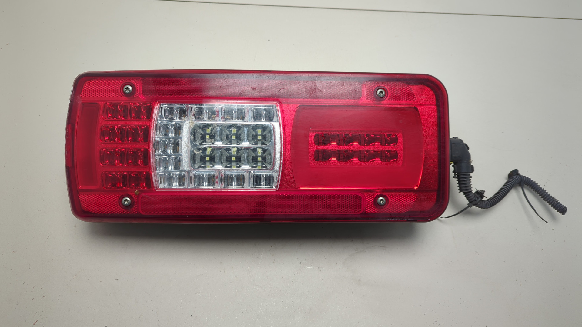 Фонарь задний левый