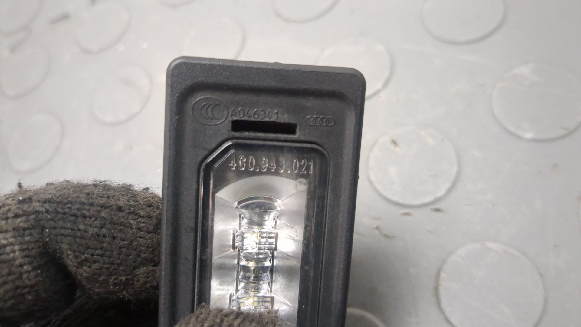 Фонарь подсветки номера