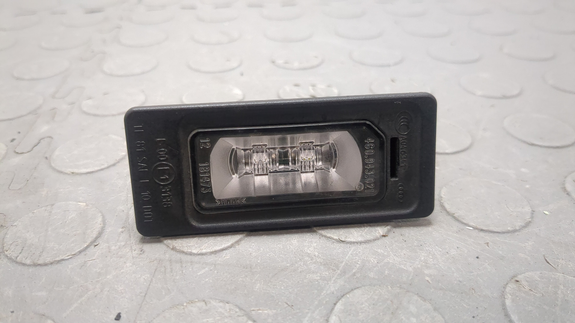 Фонарь подсветки номера