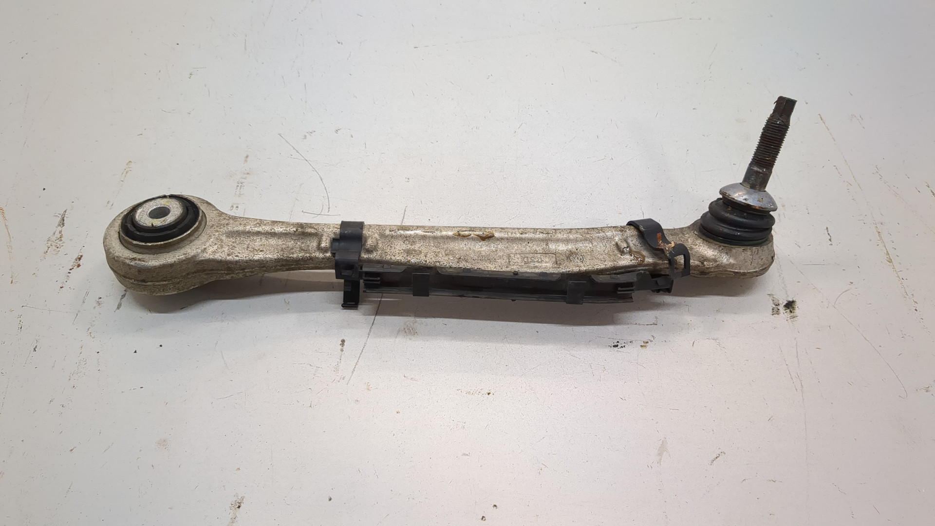 Рычаг задний левый