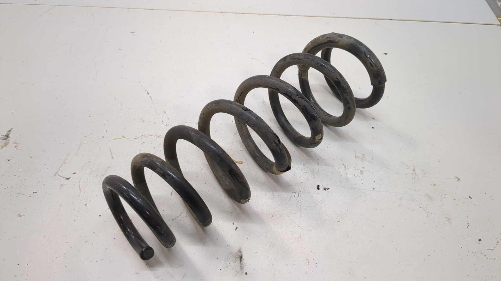 Пружина задняя