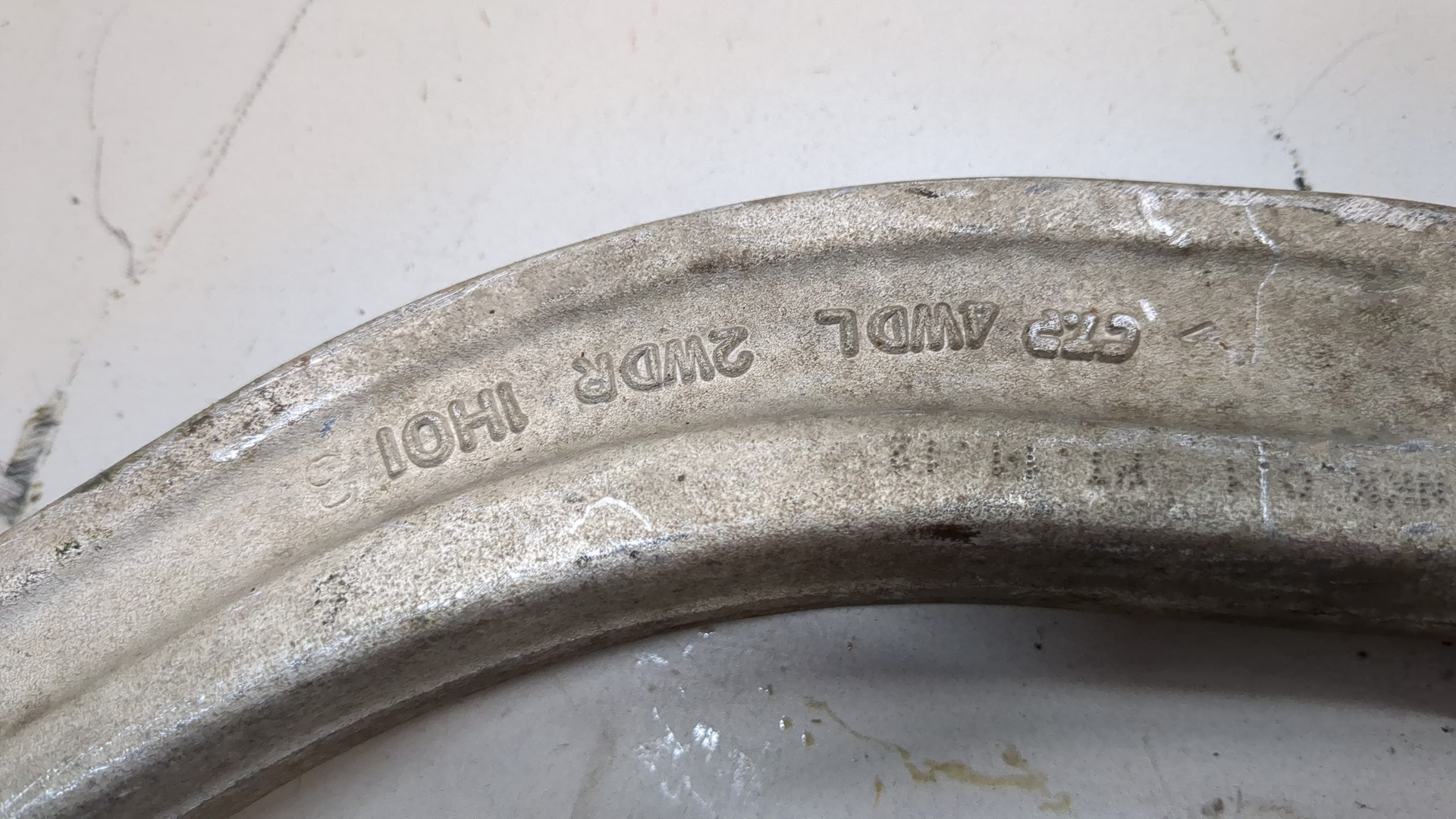 Рычаг передний левый