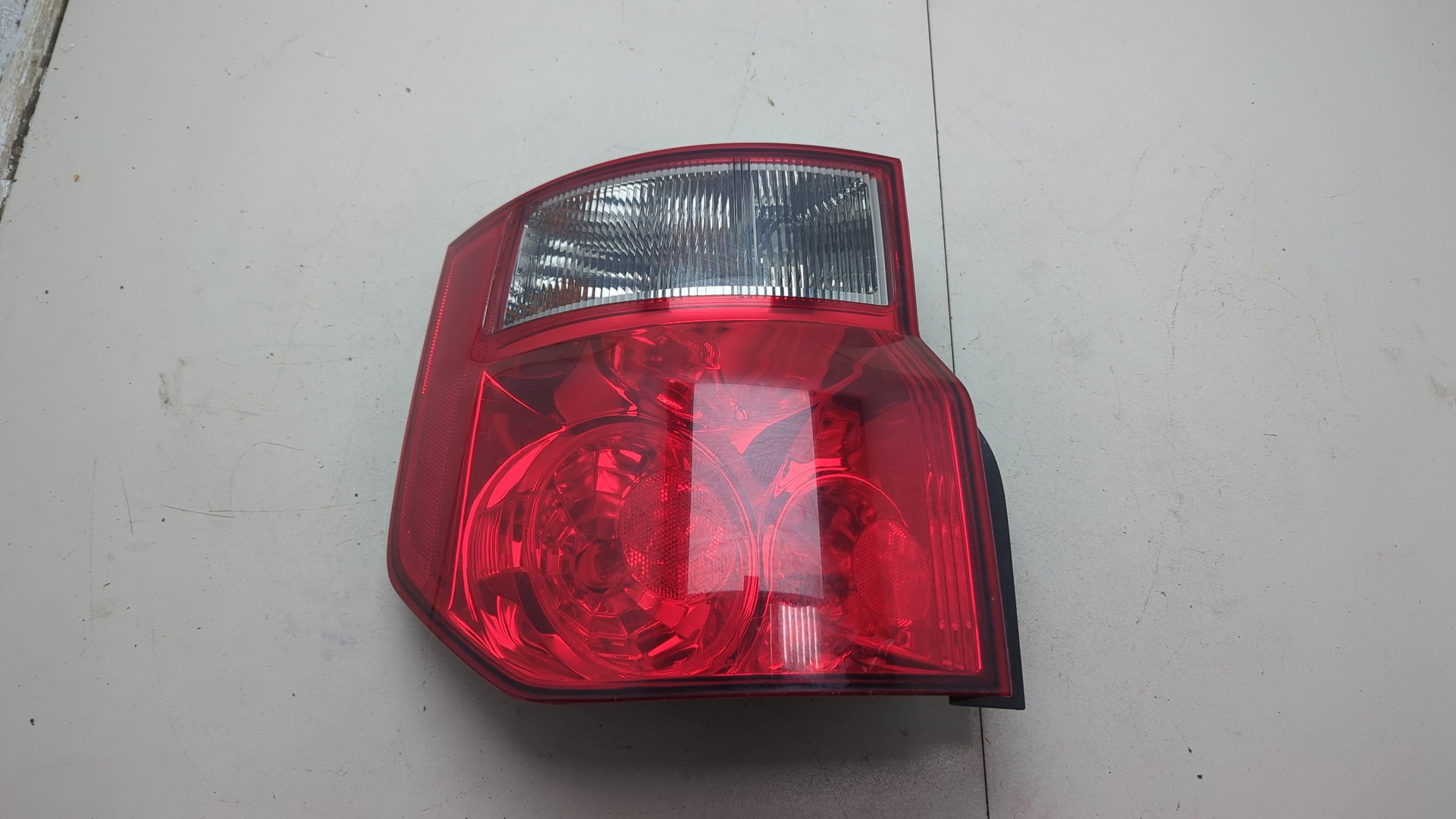 Фонарь задний левый