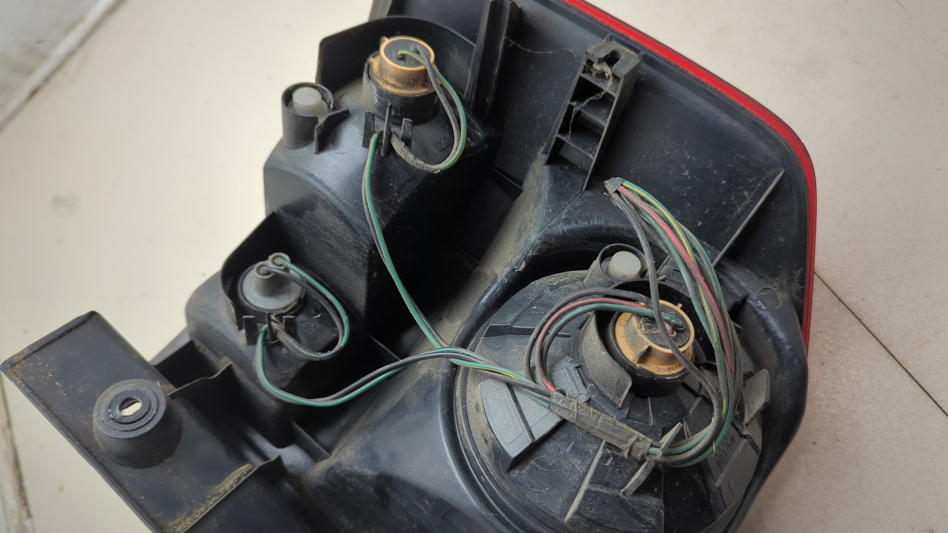 Фонарь задний левый