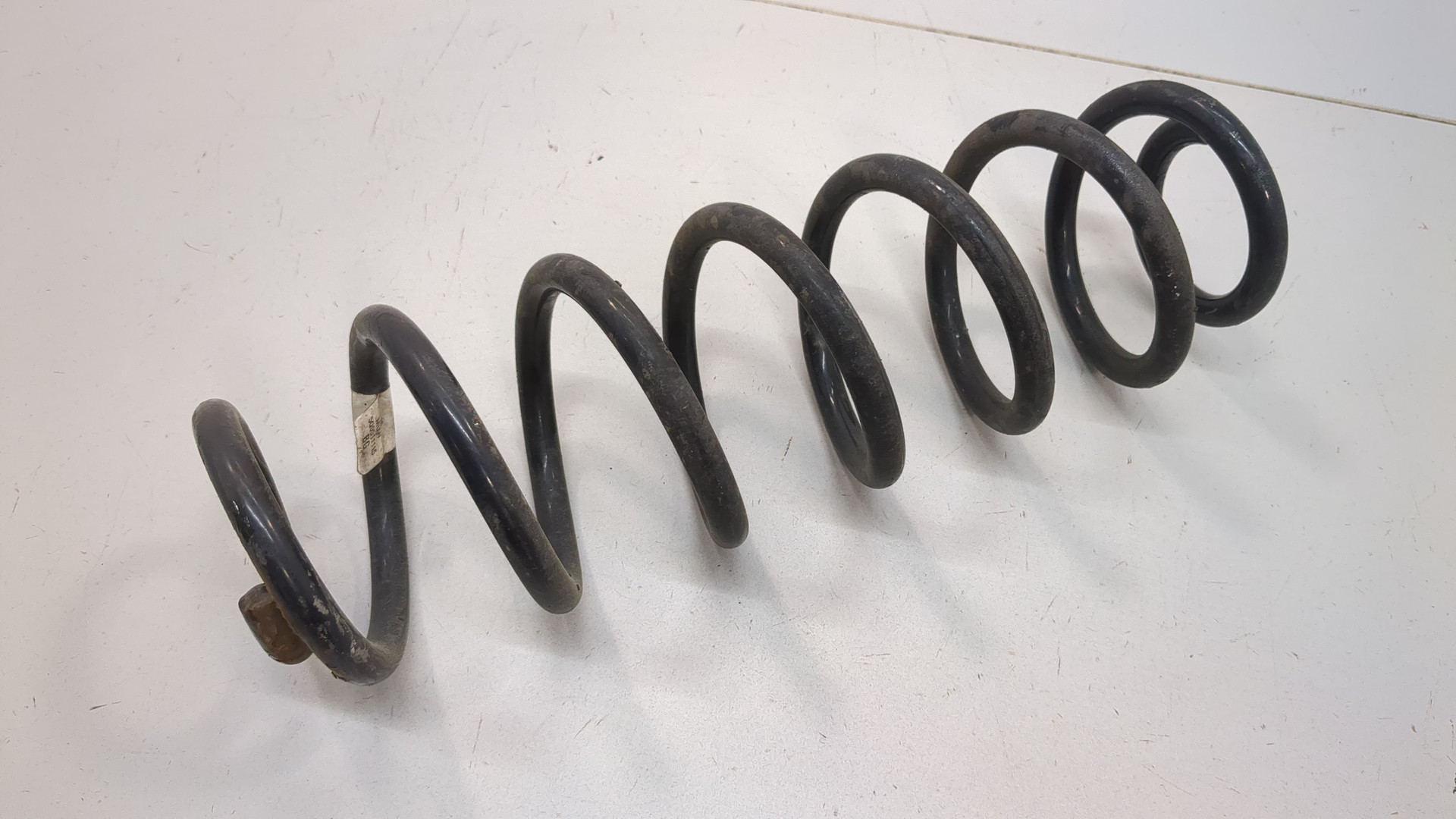 Пружина задняя