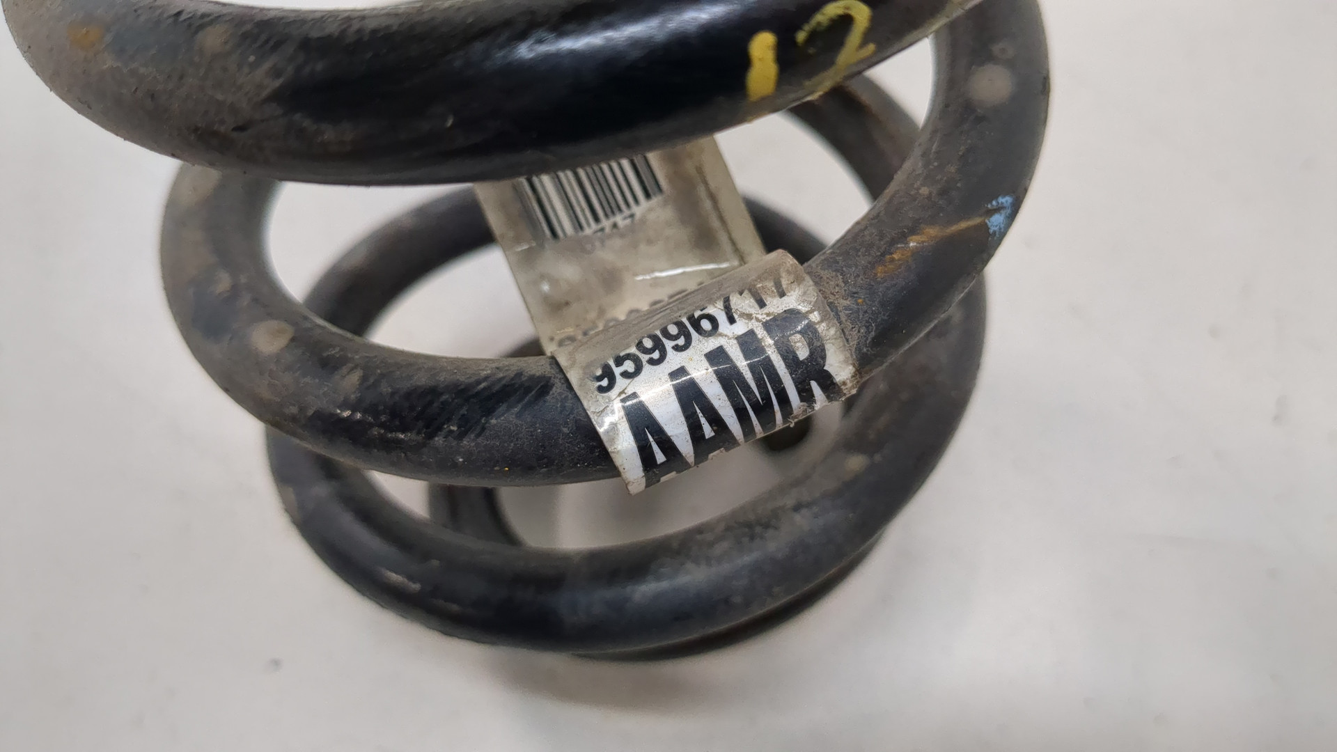 Пружина задняя