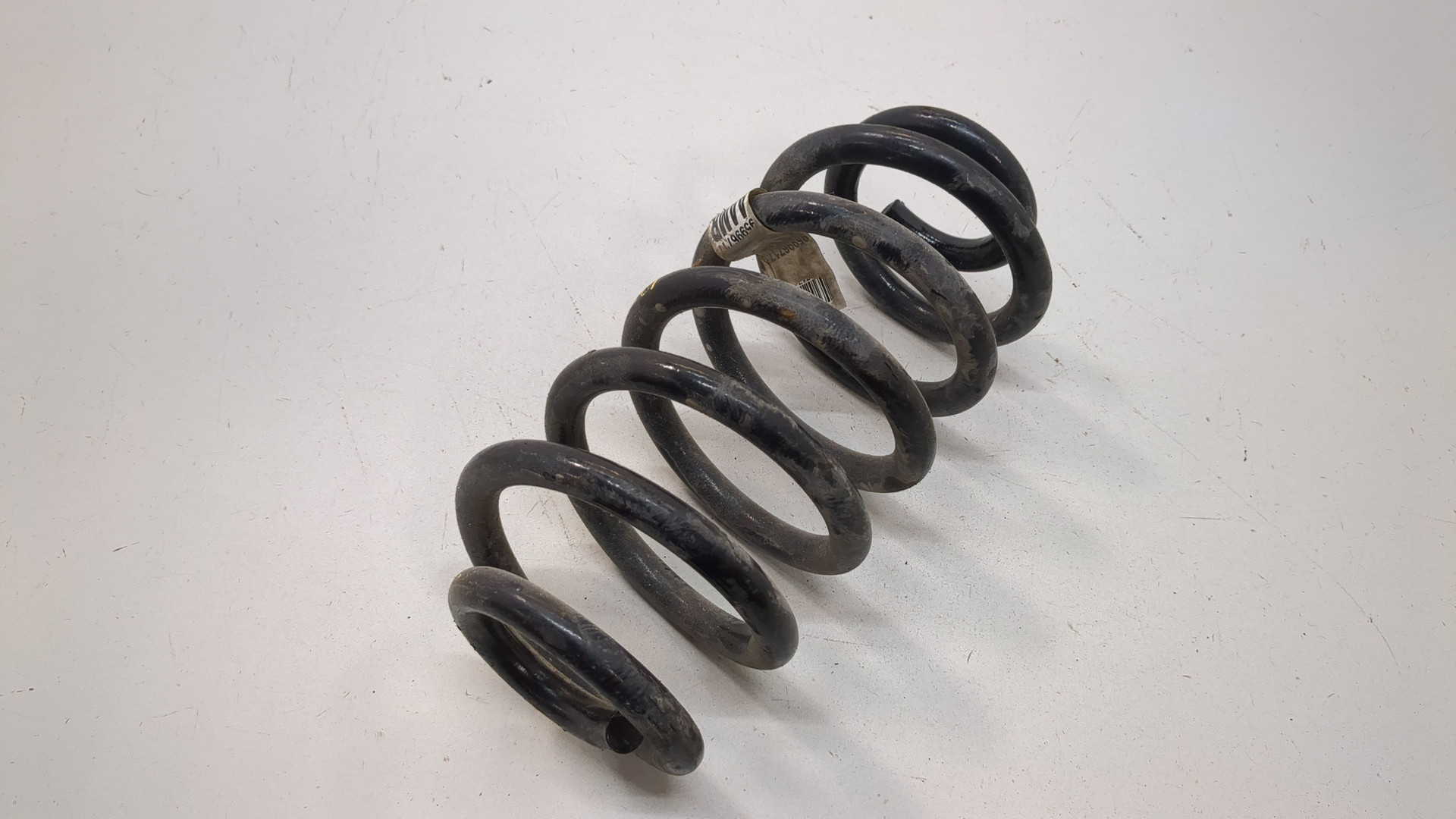 Пружина задняя