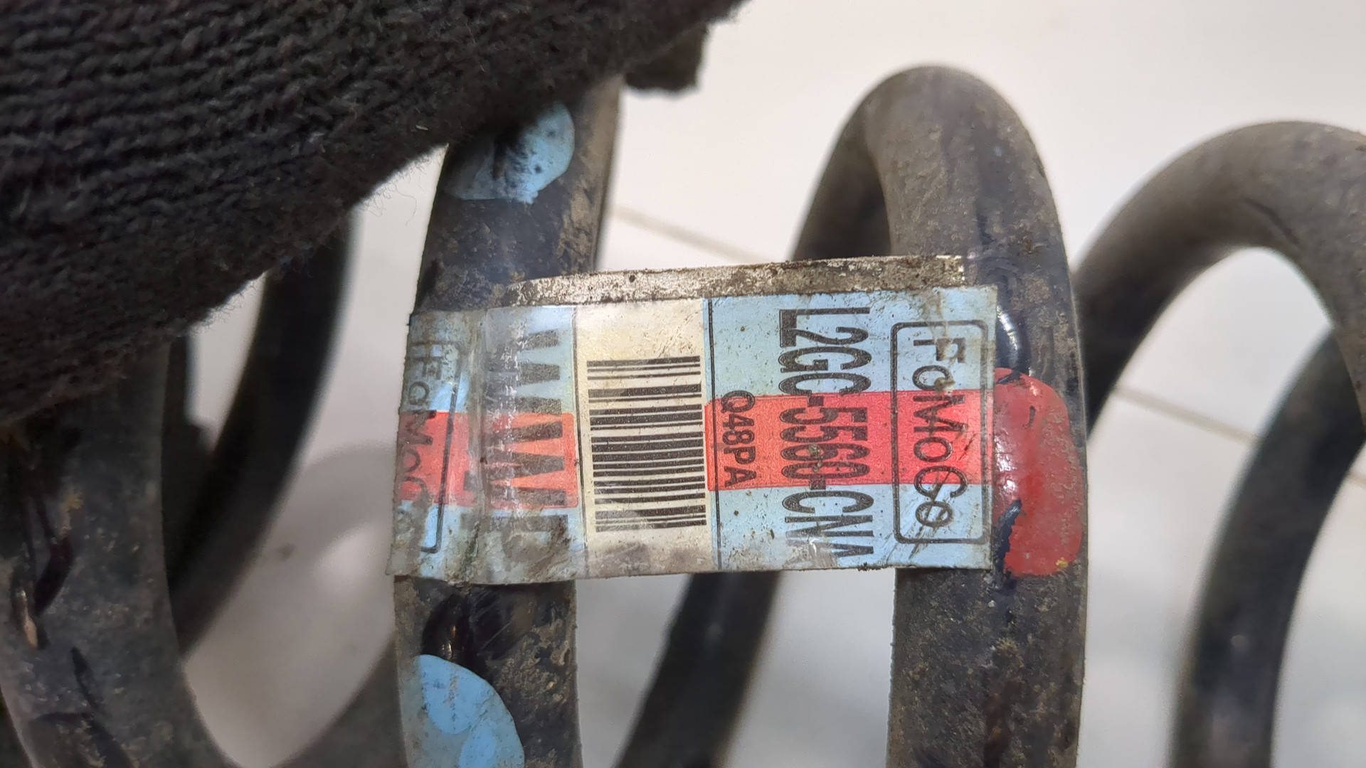 Пружина задняя