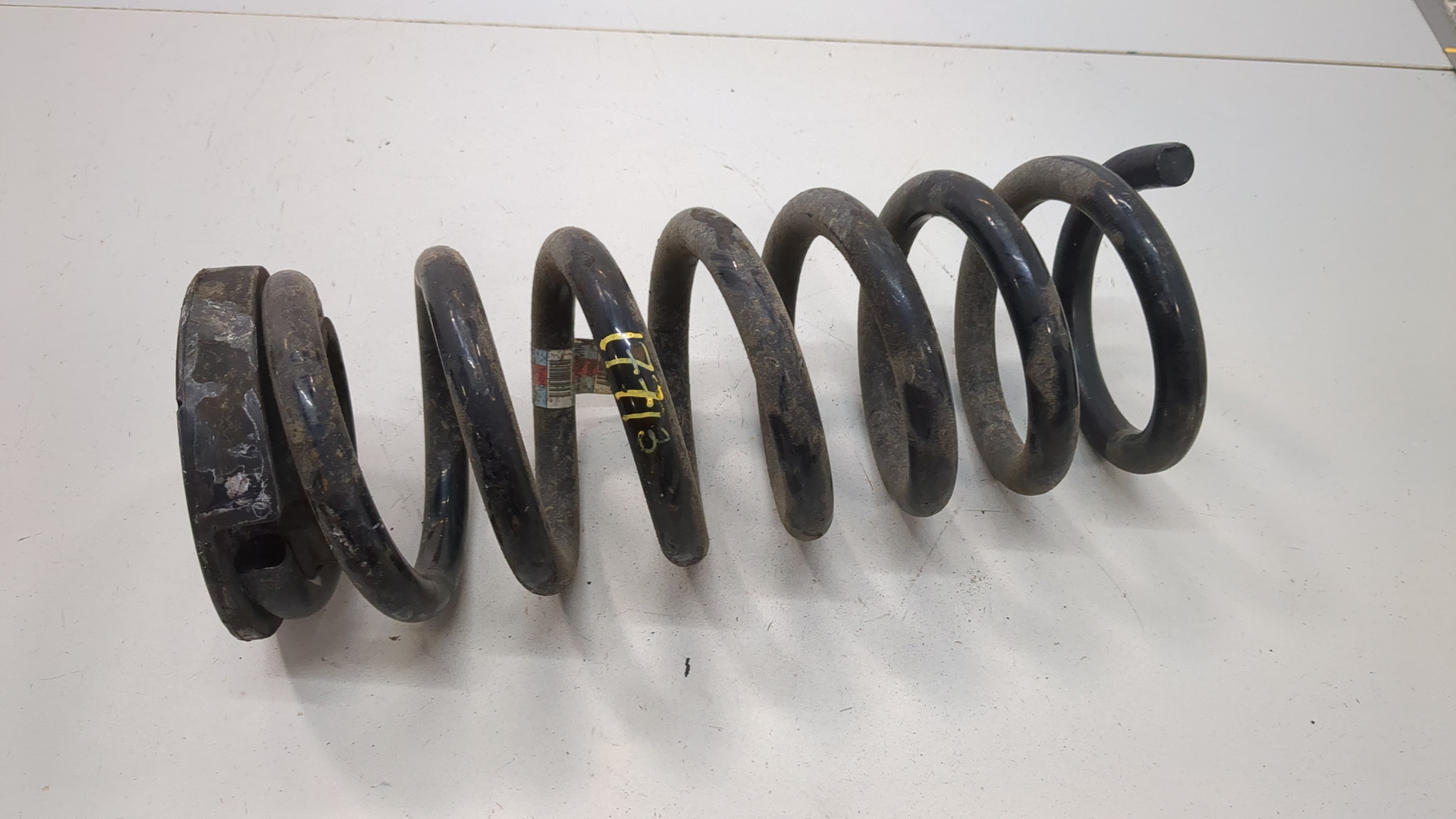 Пружина задняя