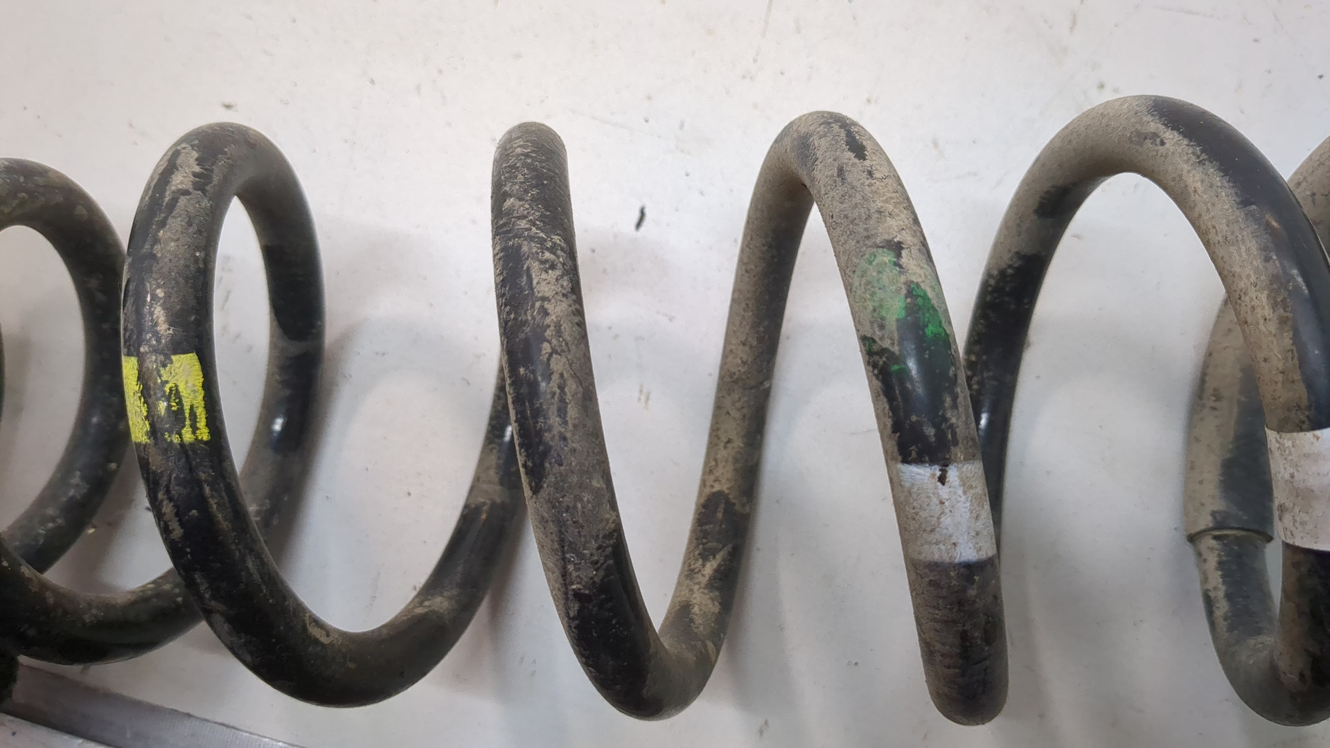 Пружина задняя