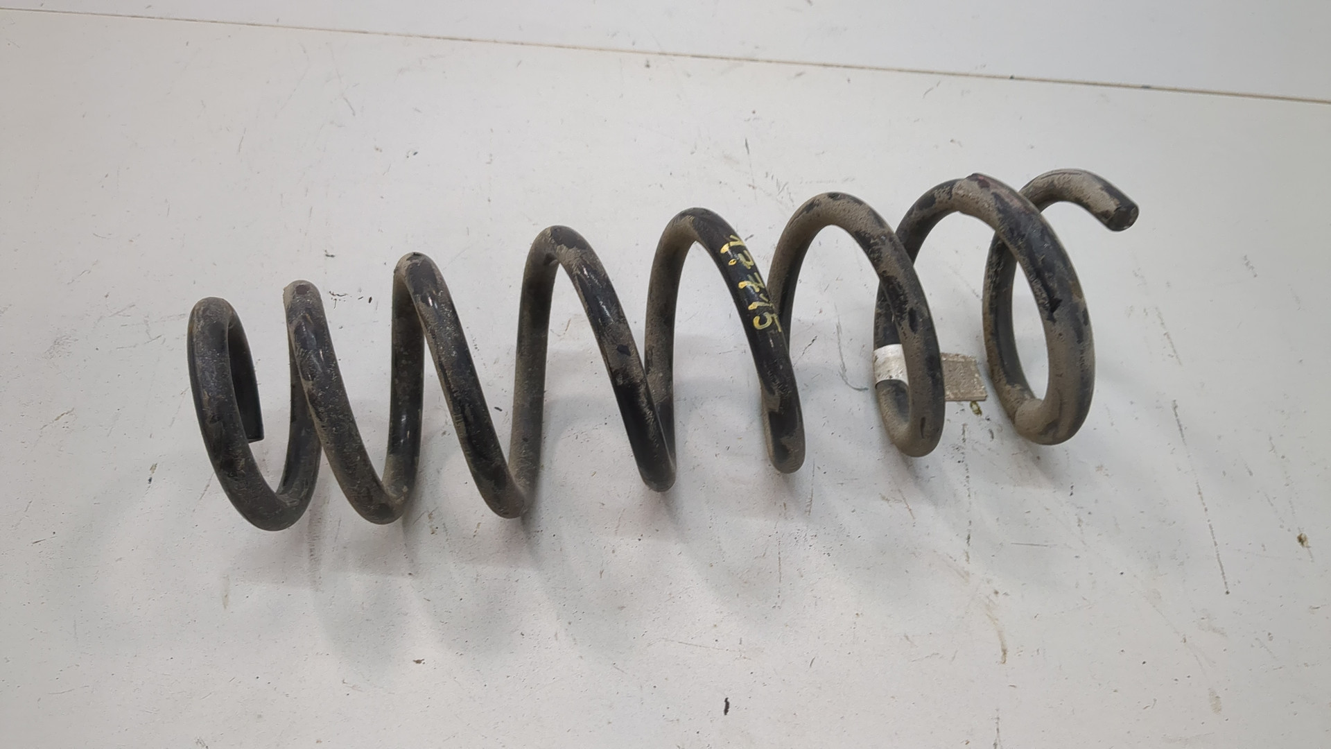 Пружина задняя