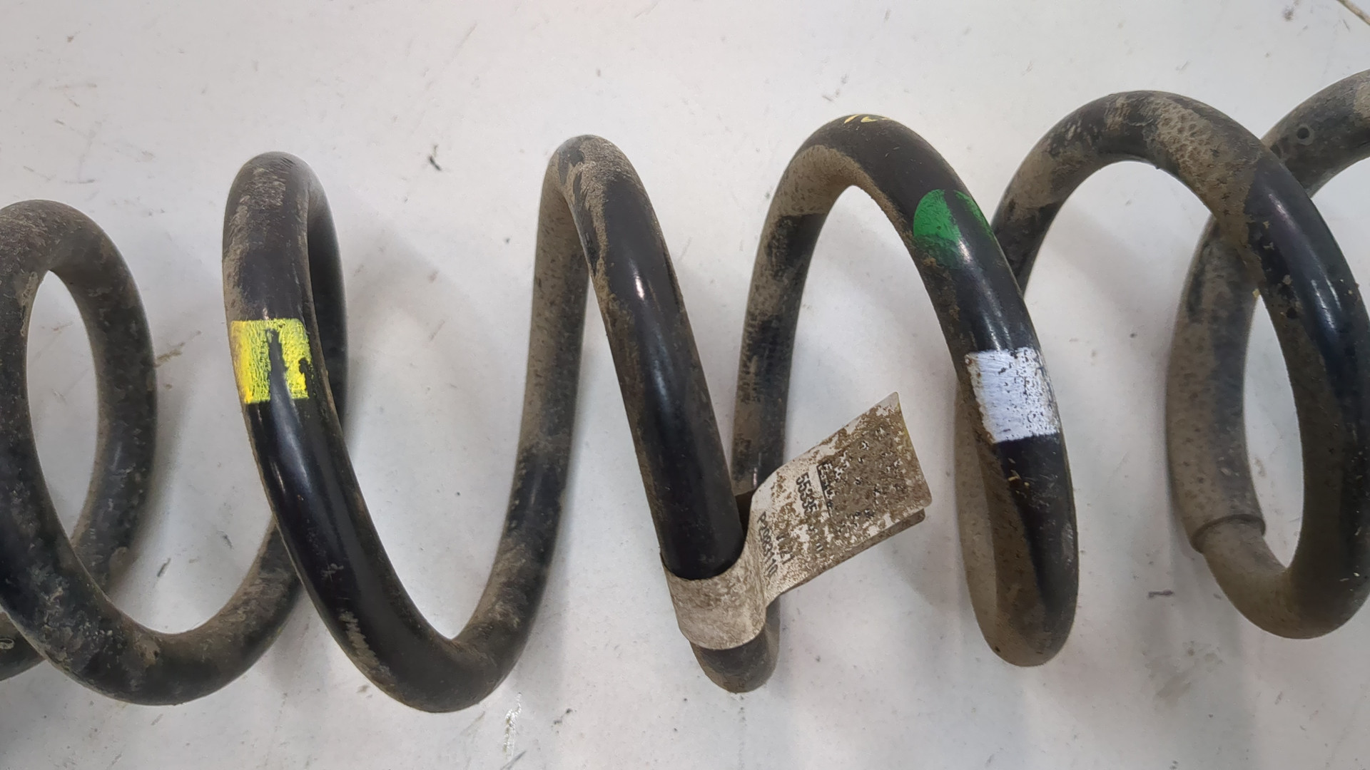 Пружина задняя