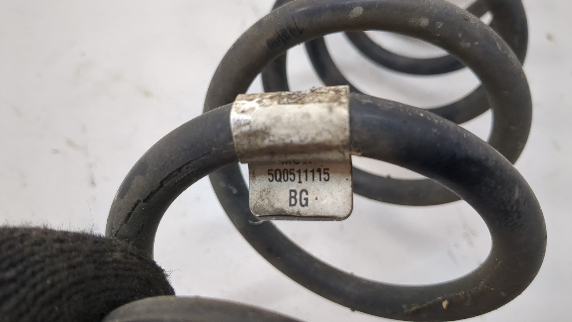 Пружина задняя