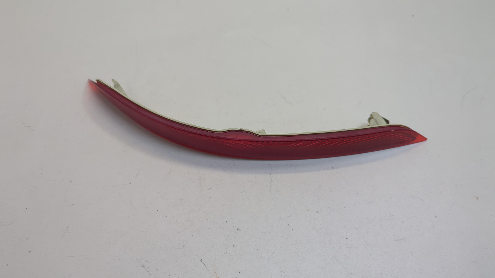 Отражатель в бампер задний левый