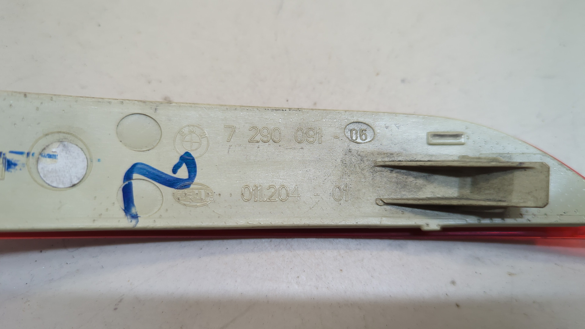 Отражатель в бампер задний левый