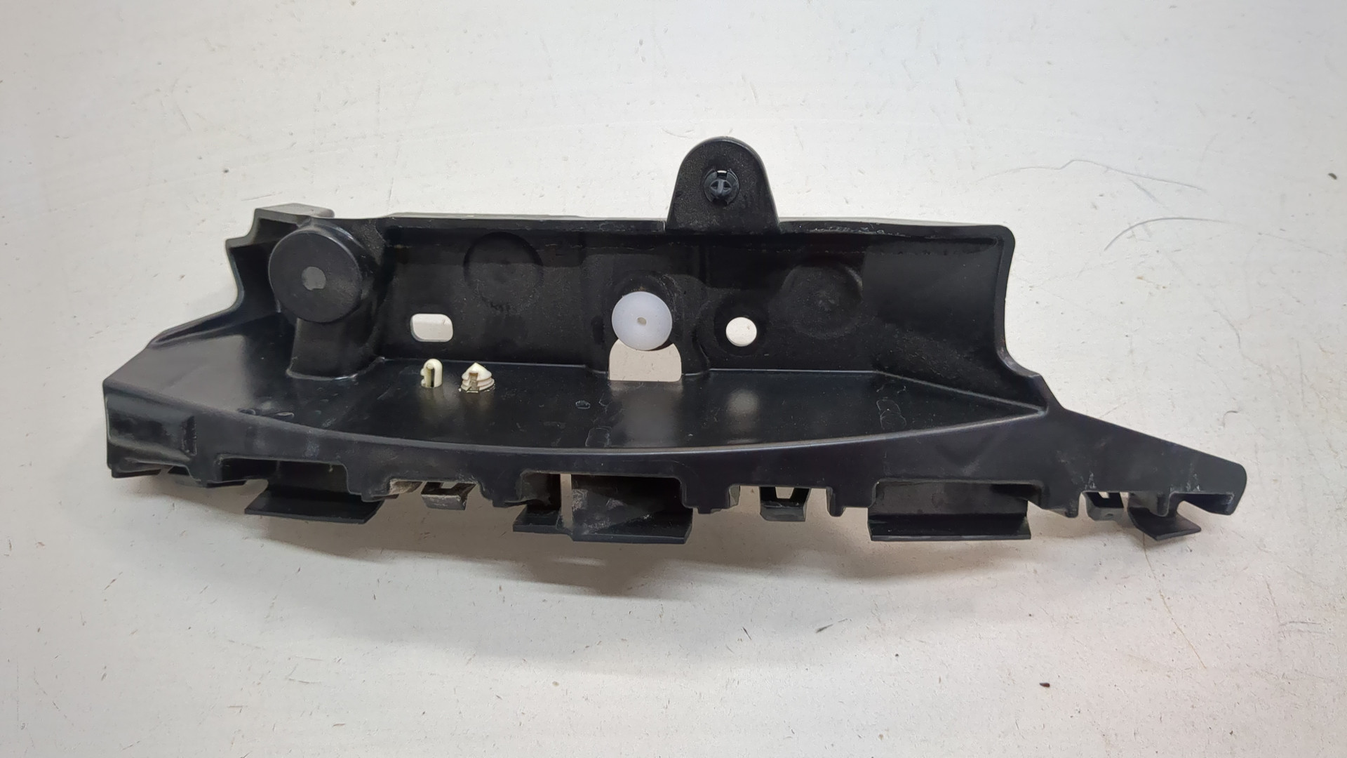 Кронштейн заднего бампера левый