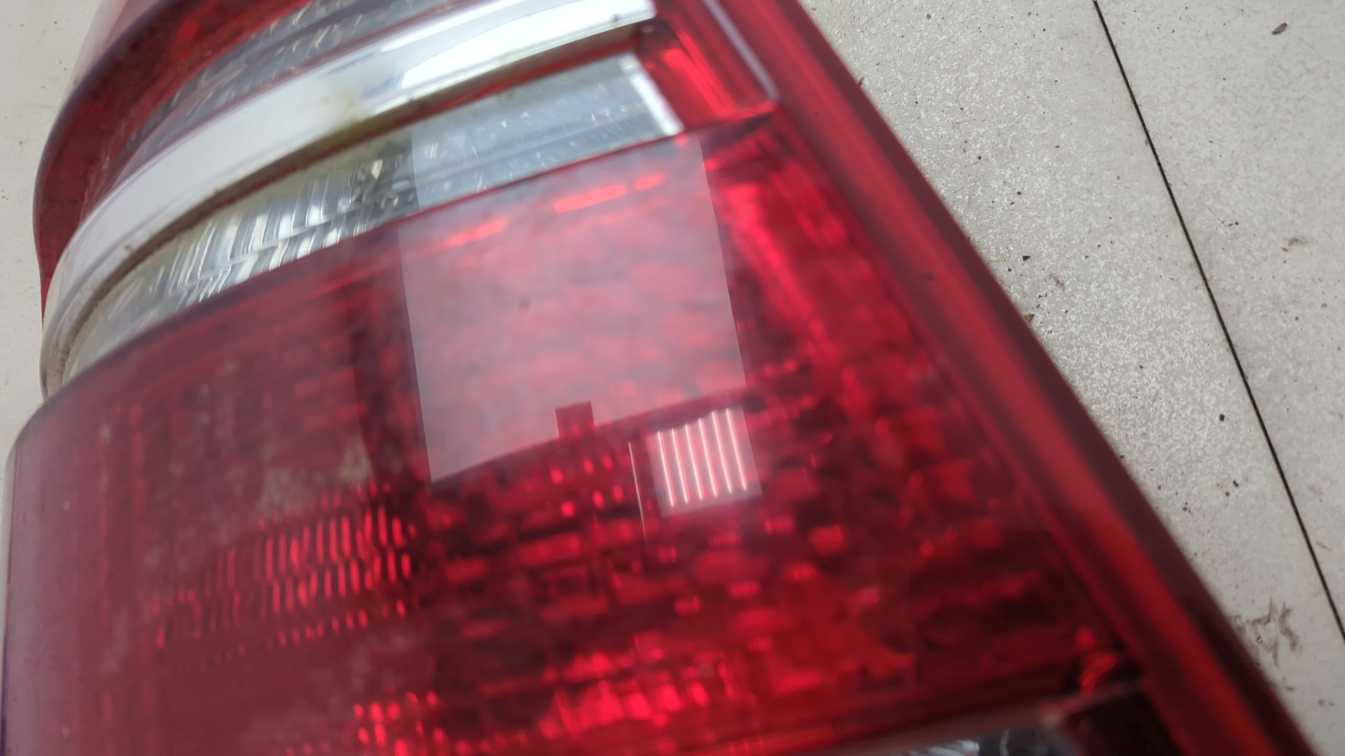 Фонарь задний левый