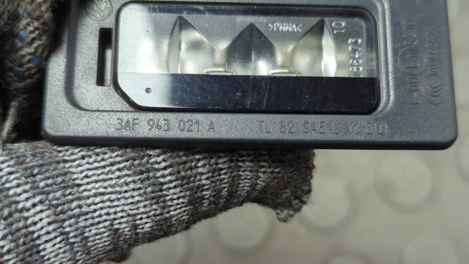 Фонарь подсветки номера