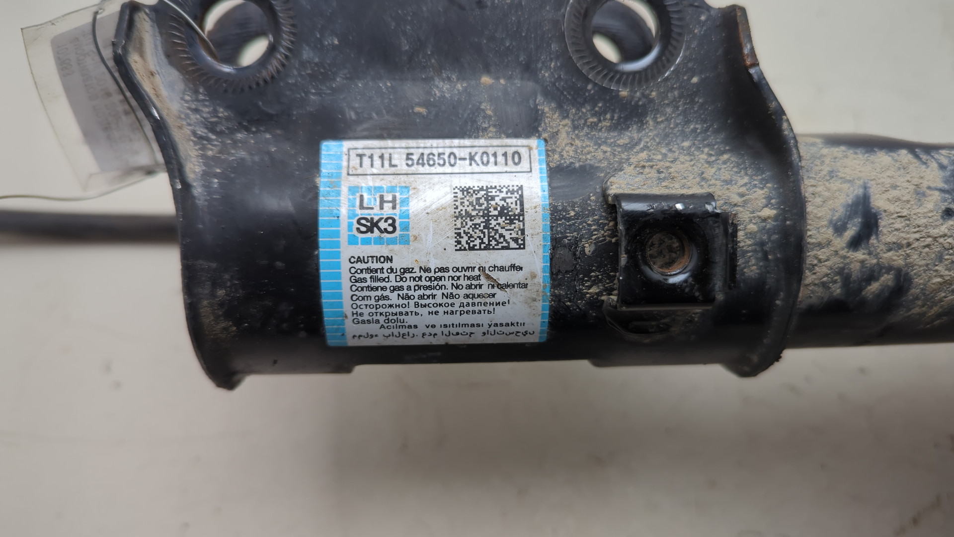 Амортизатор передний левый