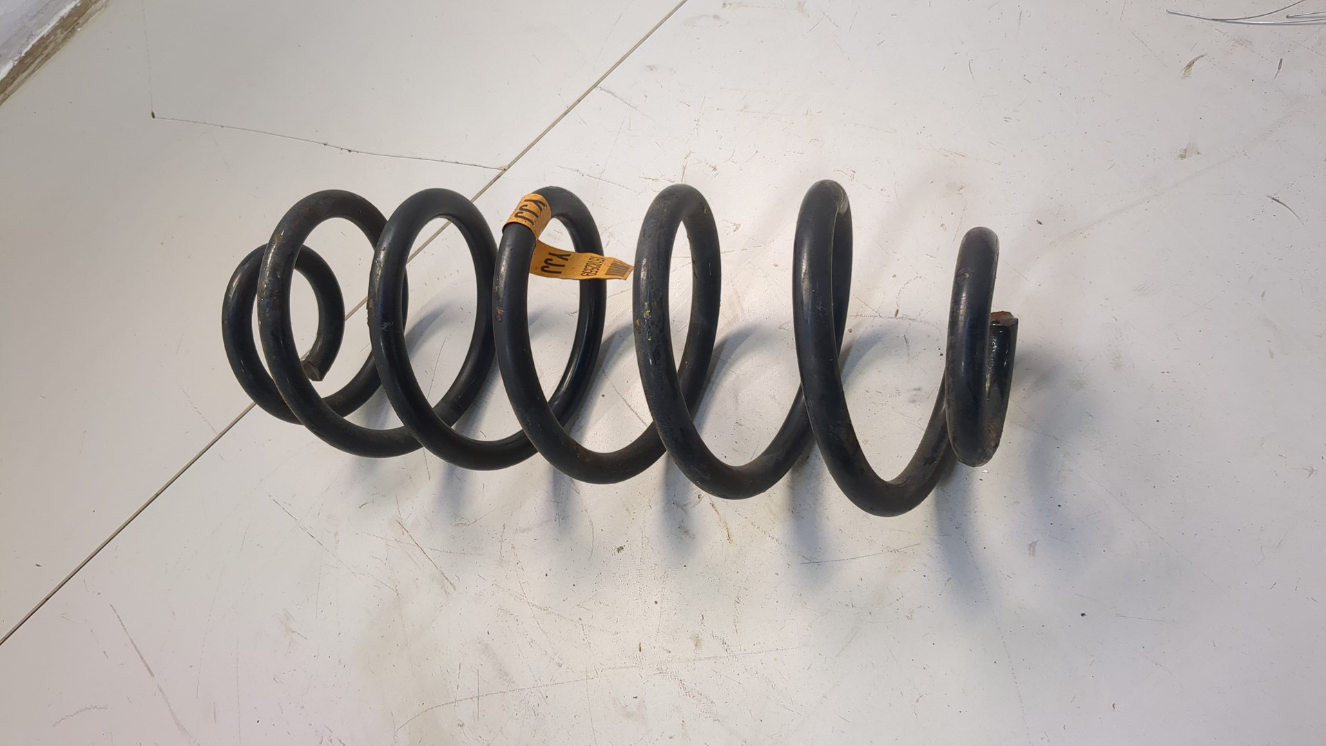 Пружина задняя