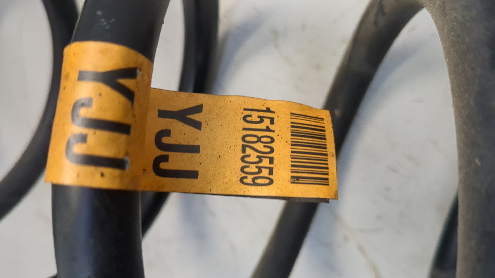 Пружина задняя