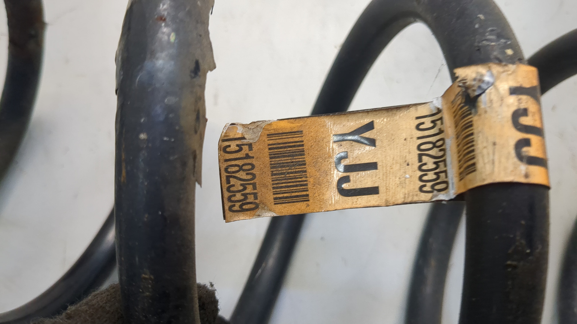 Пружина задняя