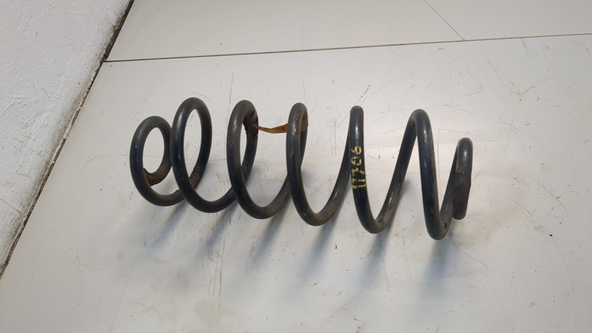 Пружина задняя