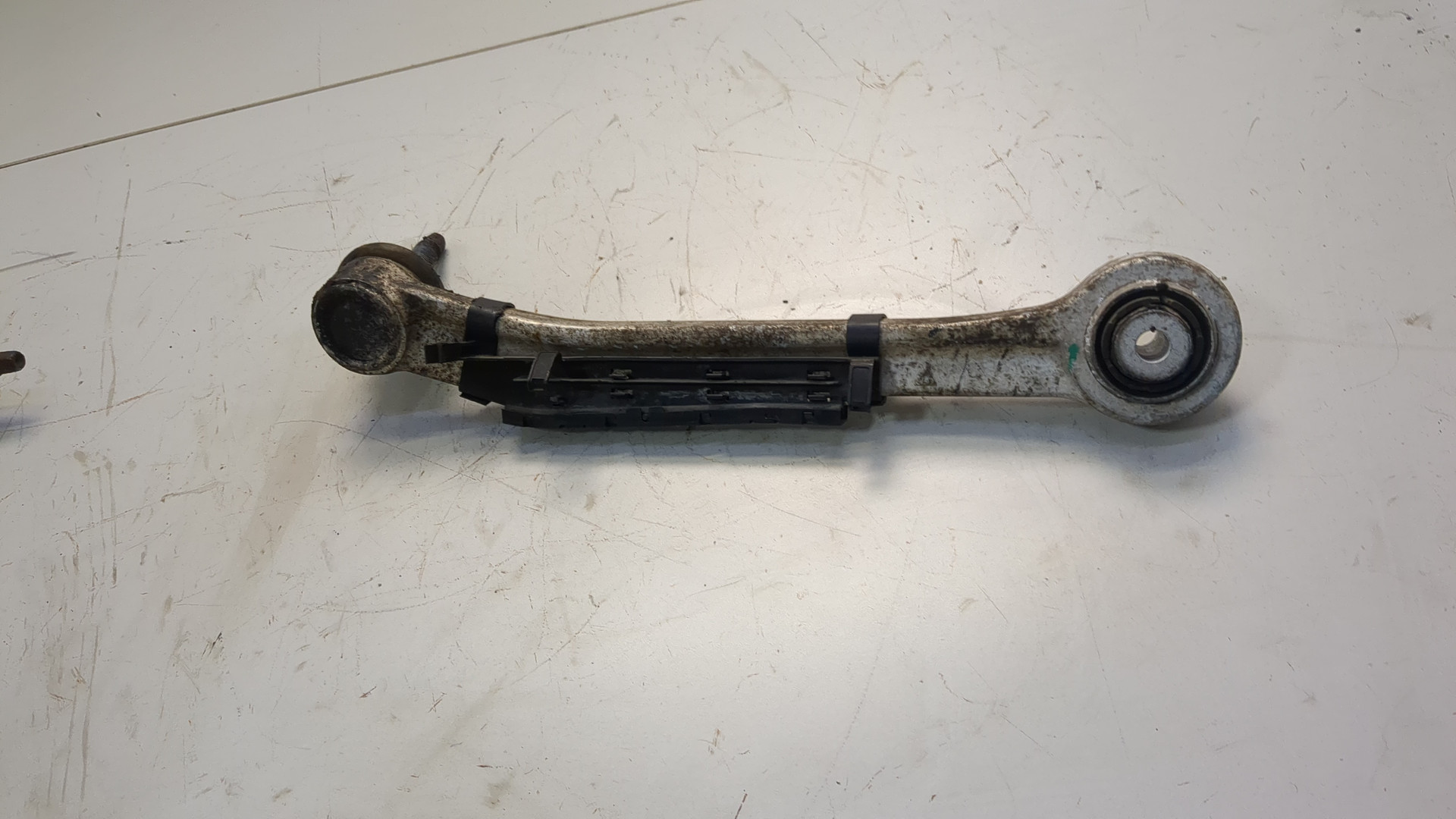 Рычаг задний левый