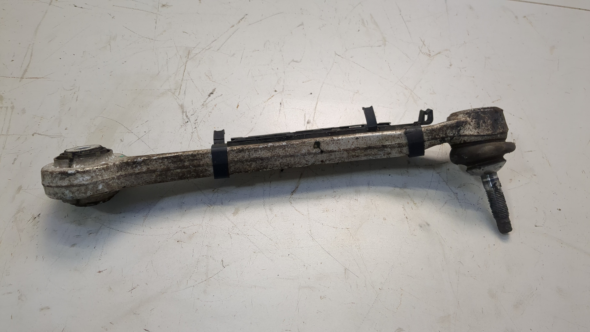 Рычаг задний левый