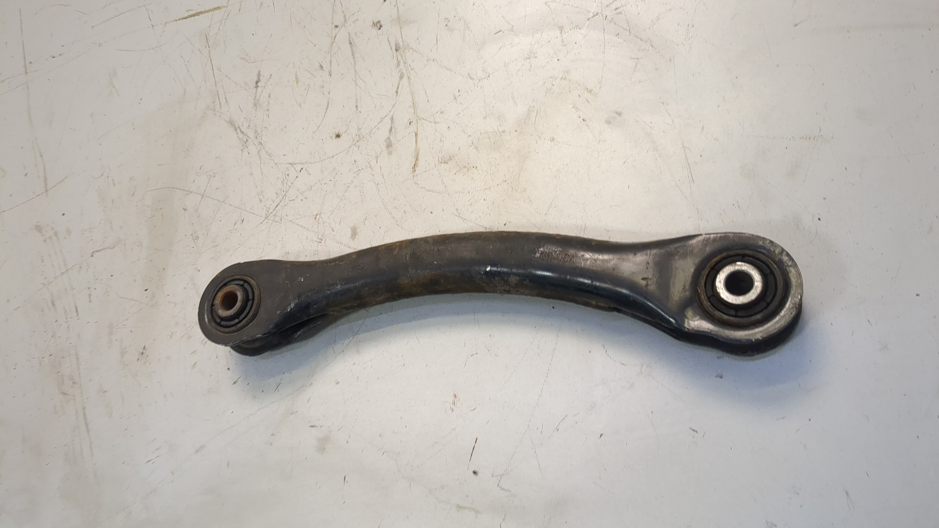 Рычаг задний