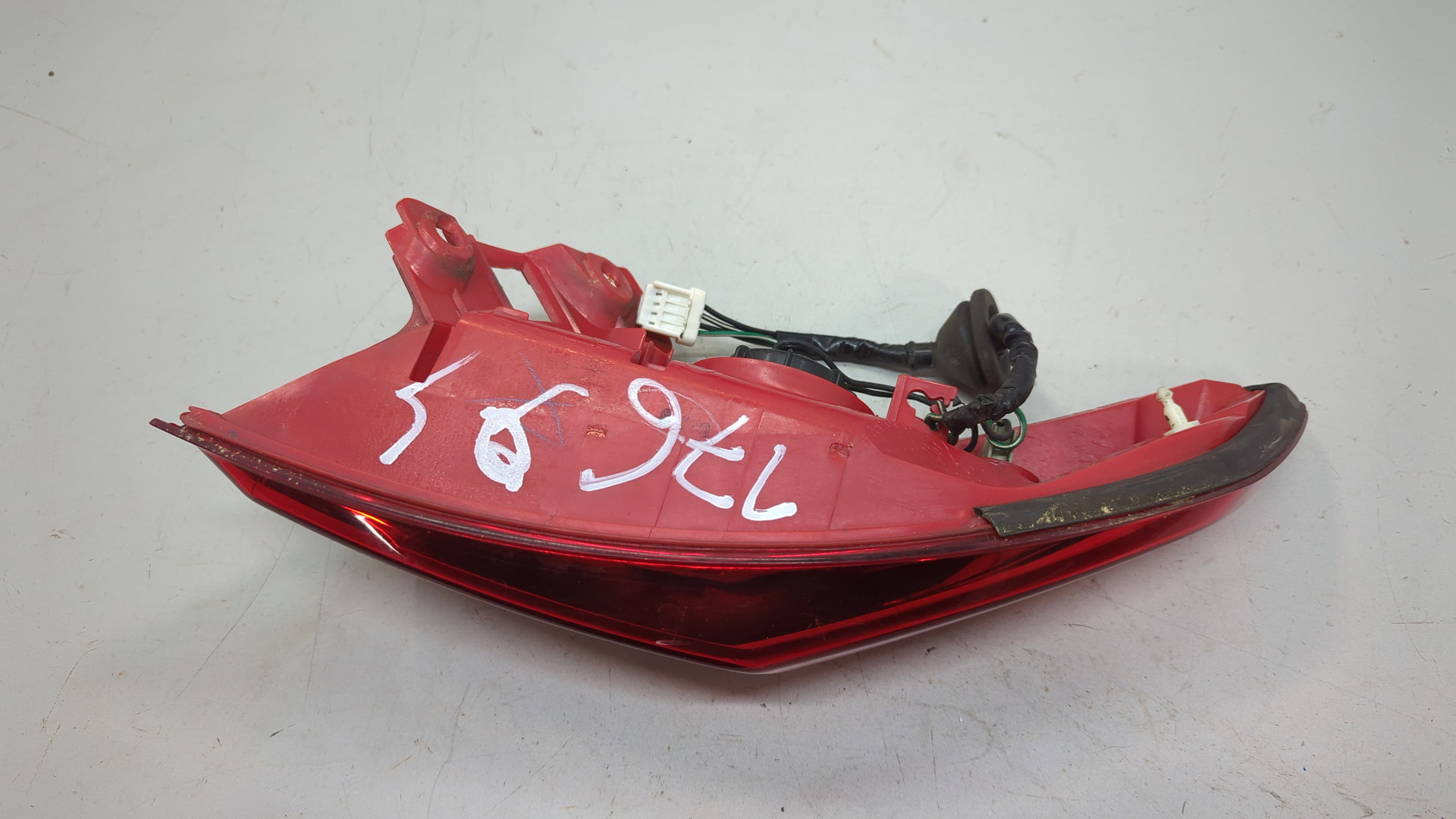 Фонарь задний левый