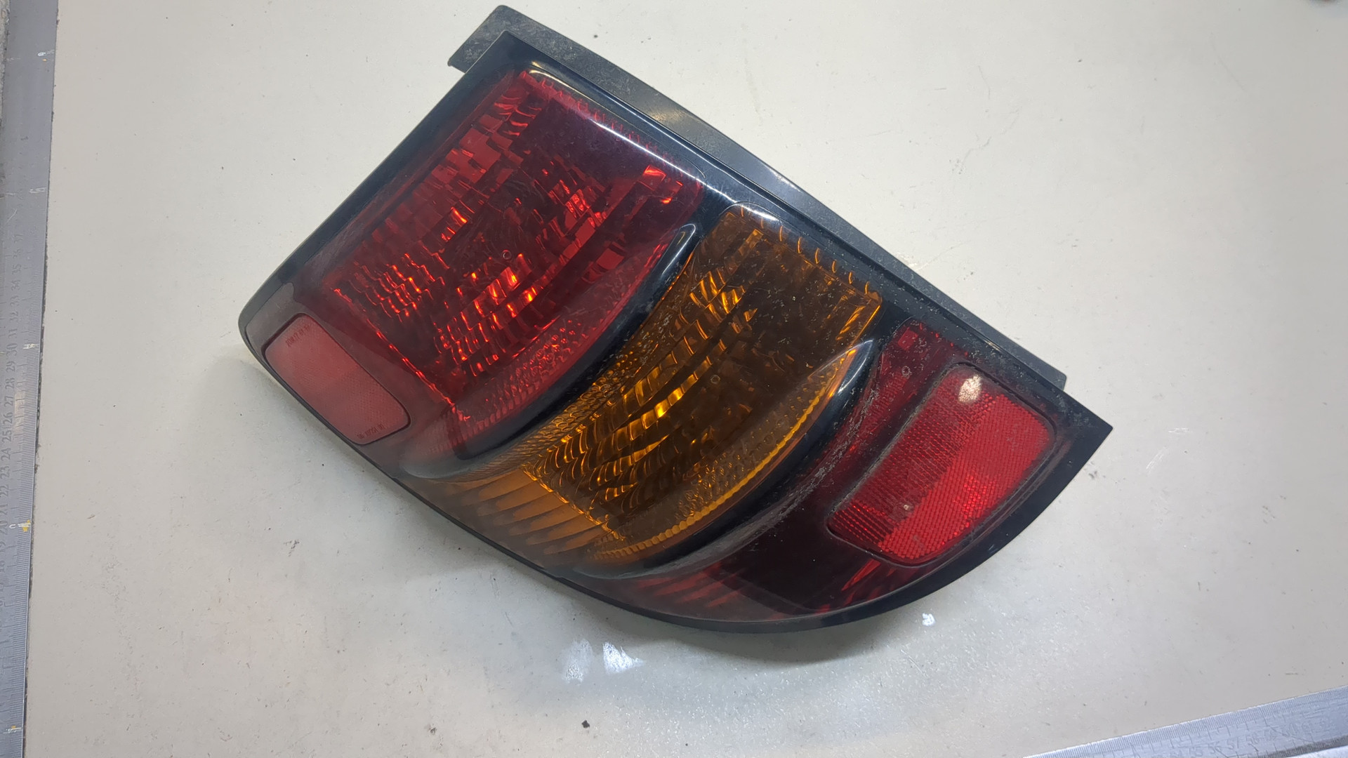 Фонарь задний левый