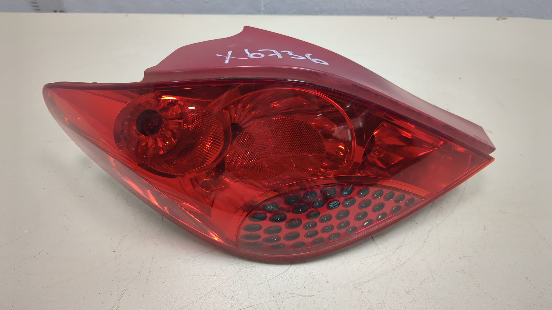 Фонарь задний левый