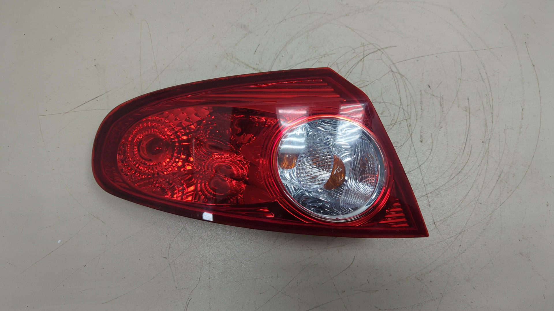 Фонарь задний левый