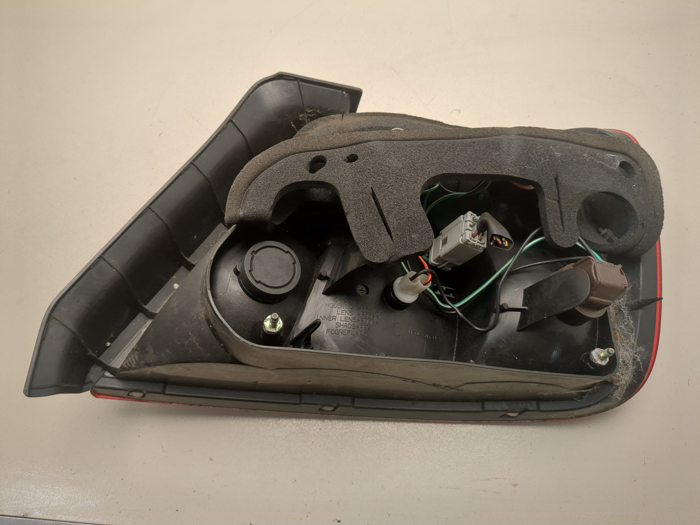 Фонарь задний левый