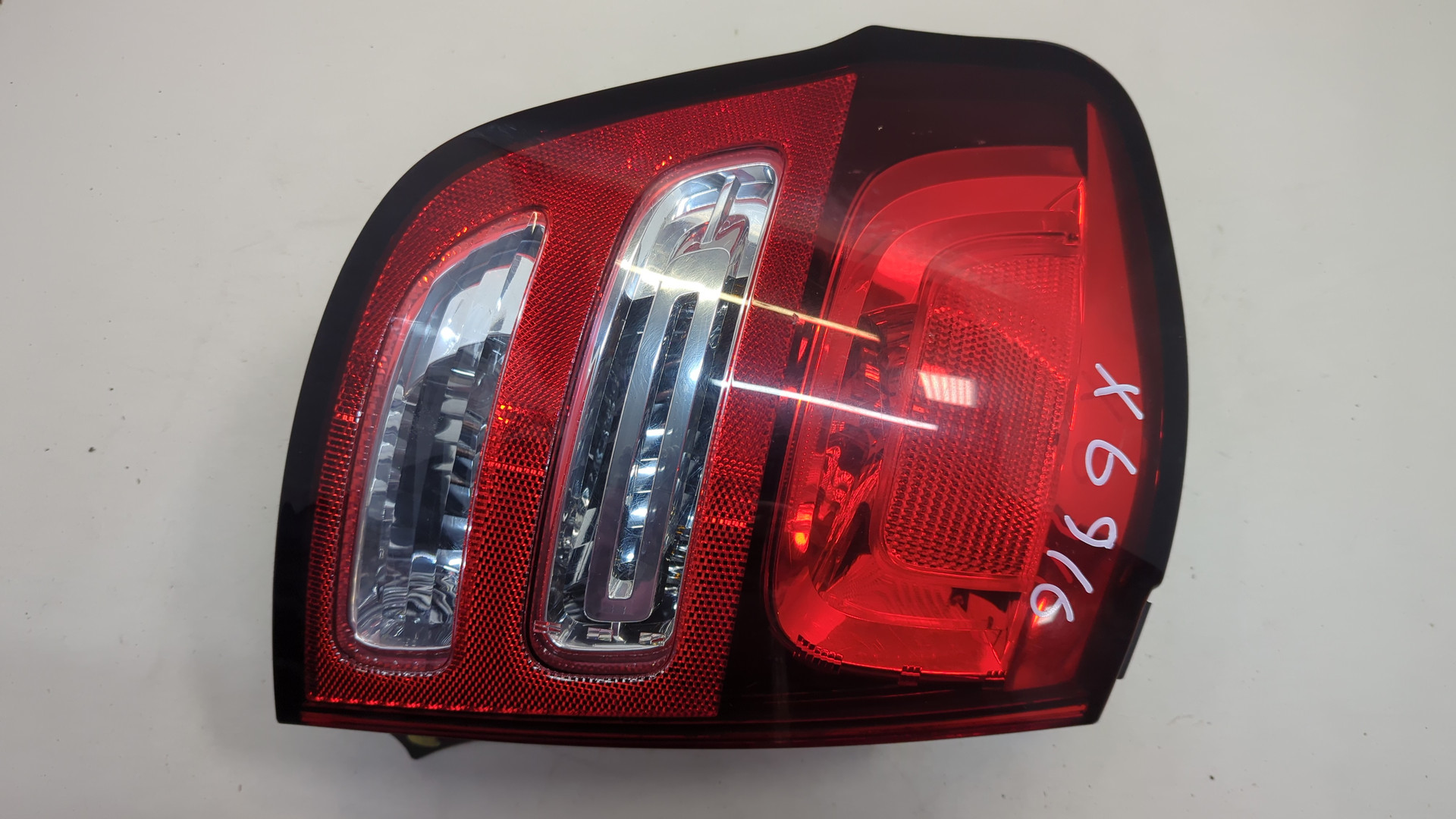 Фонарь задний левый