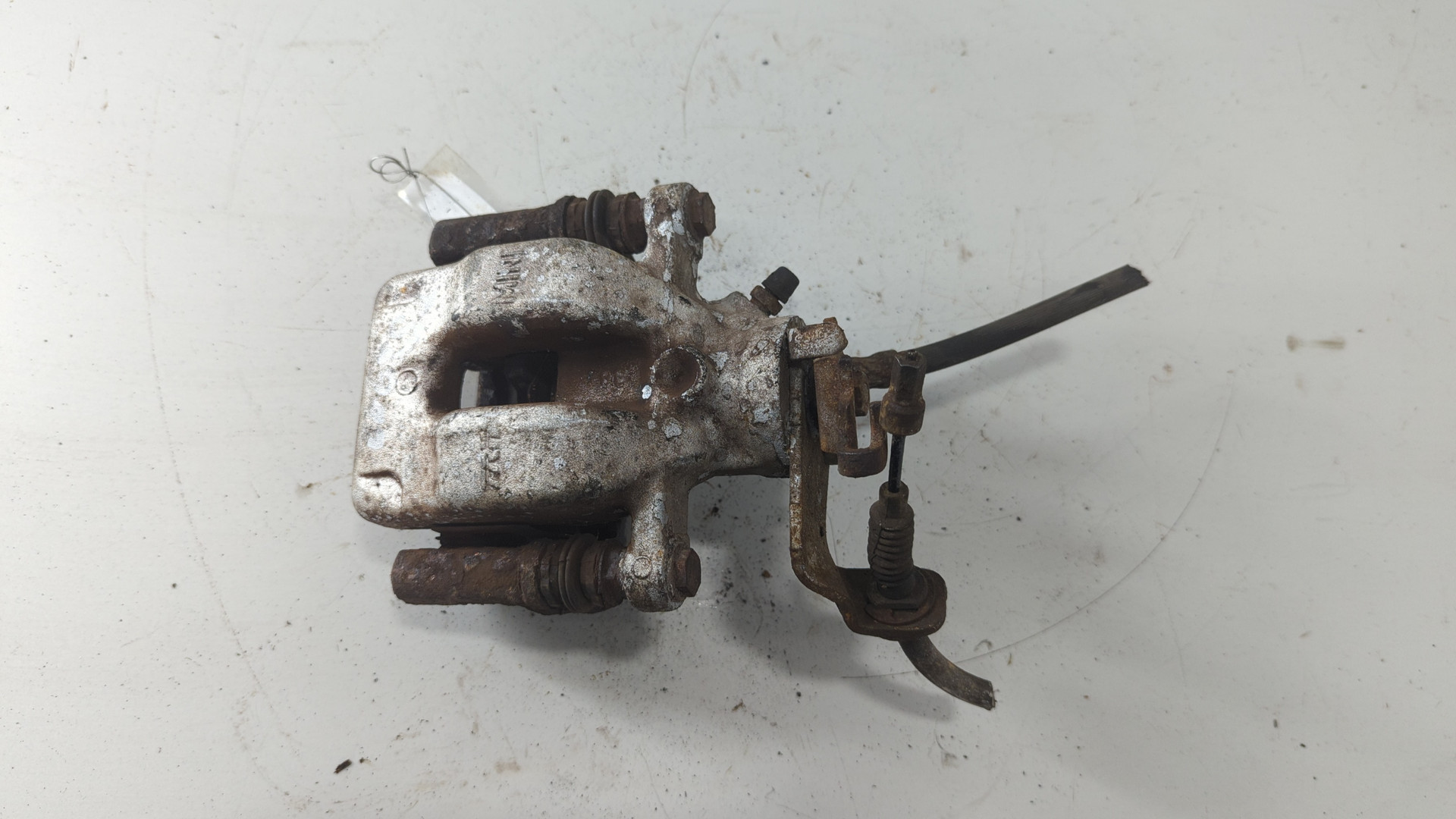 Суппорт задний левый