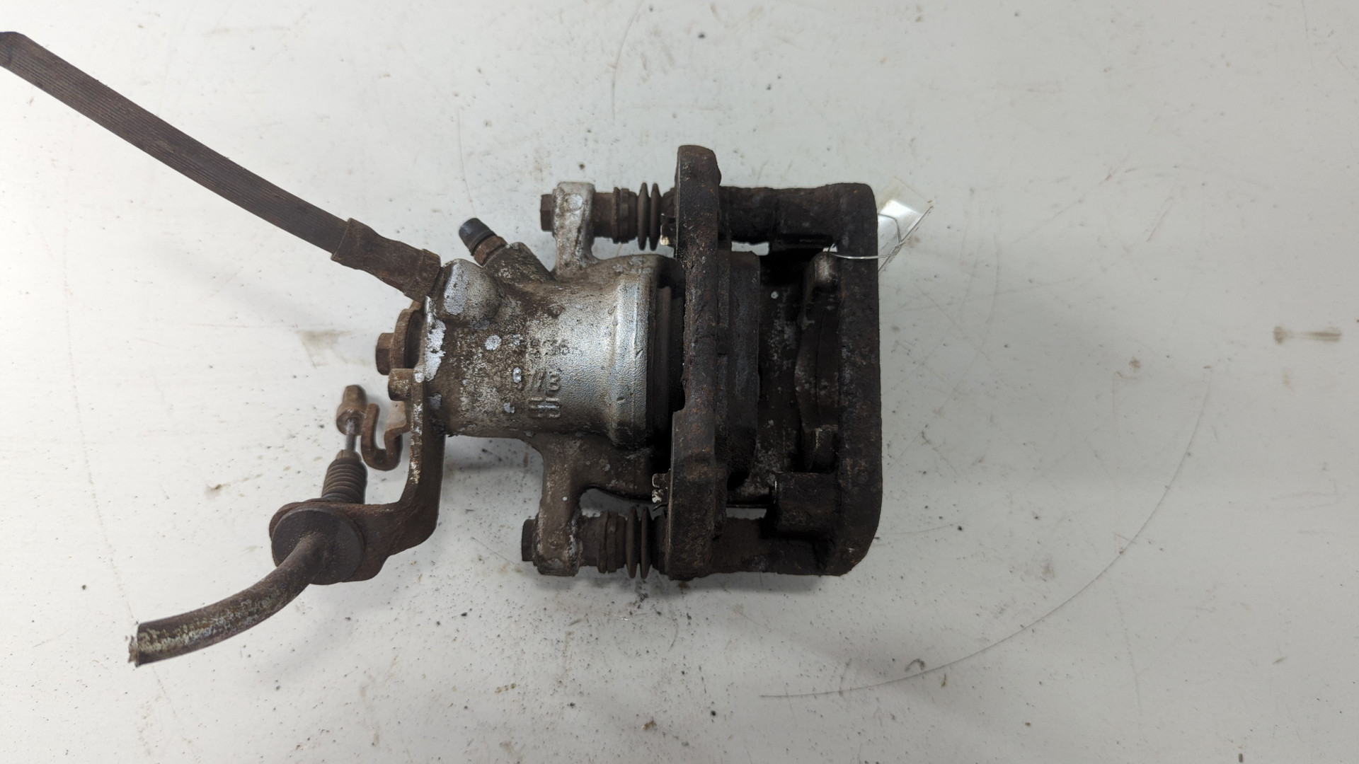 Суппорт задний левый