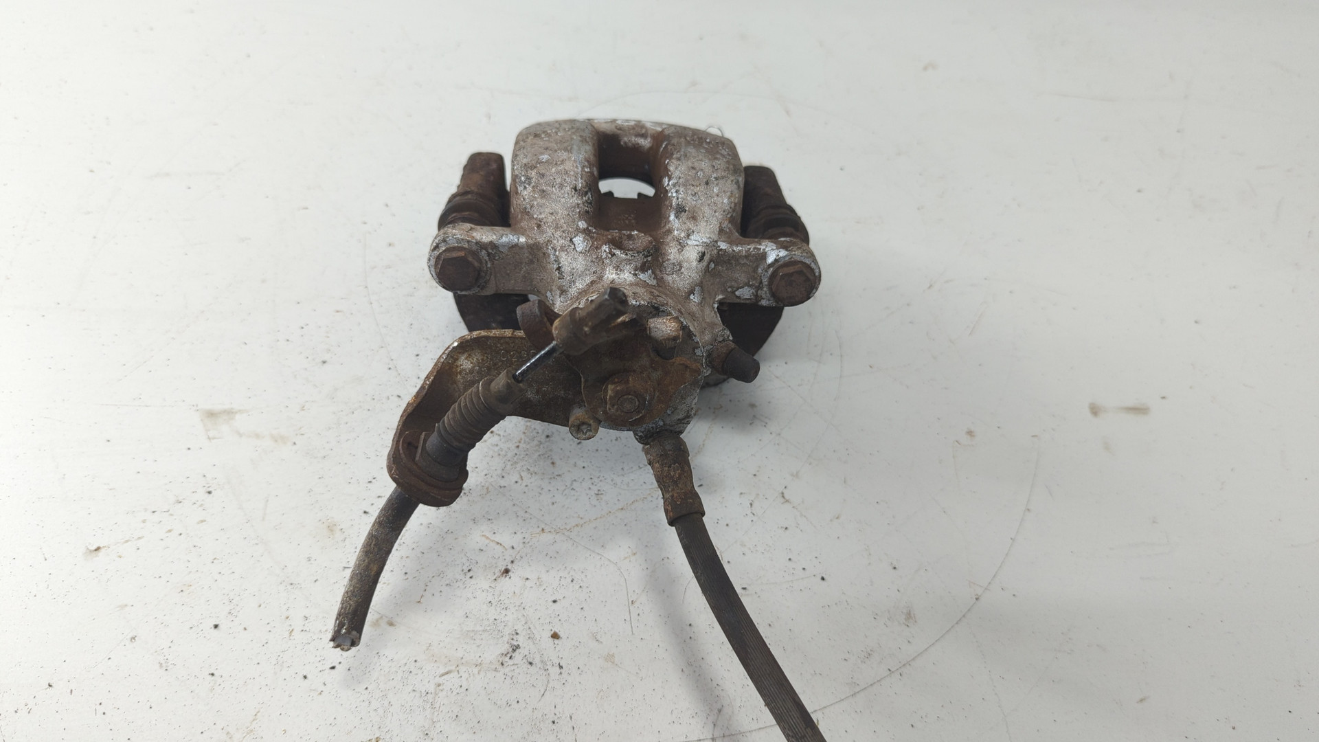 Суппорт задний левый