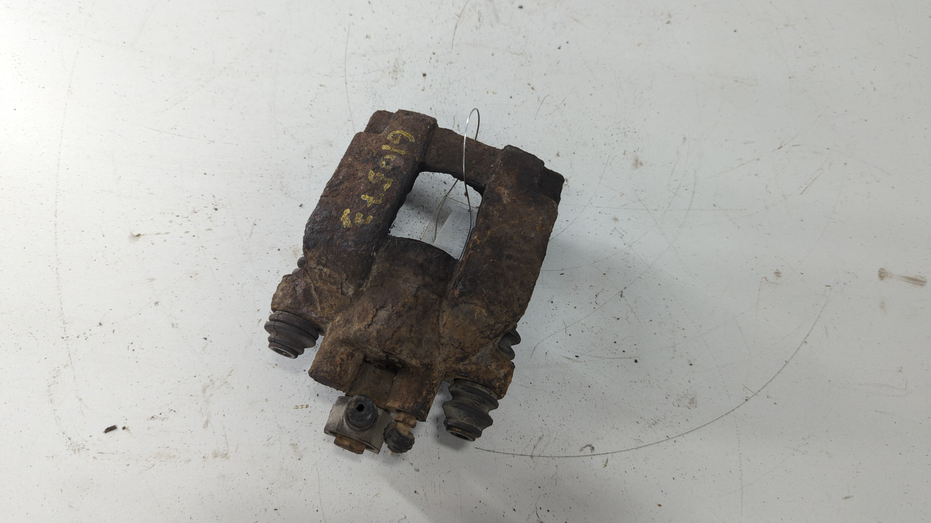 Суппорт задний левый