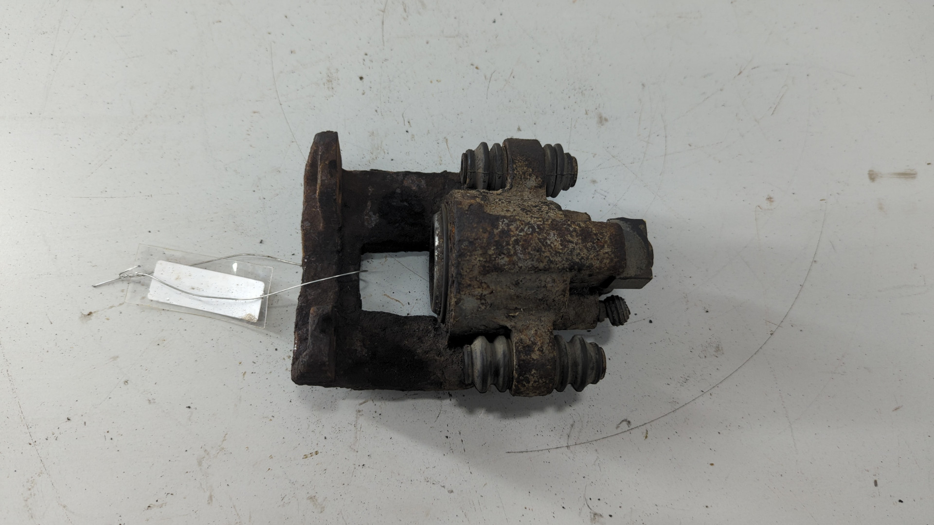 Суппорт задний левый