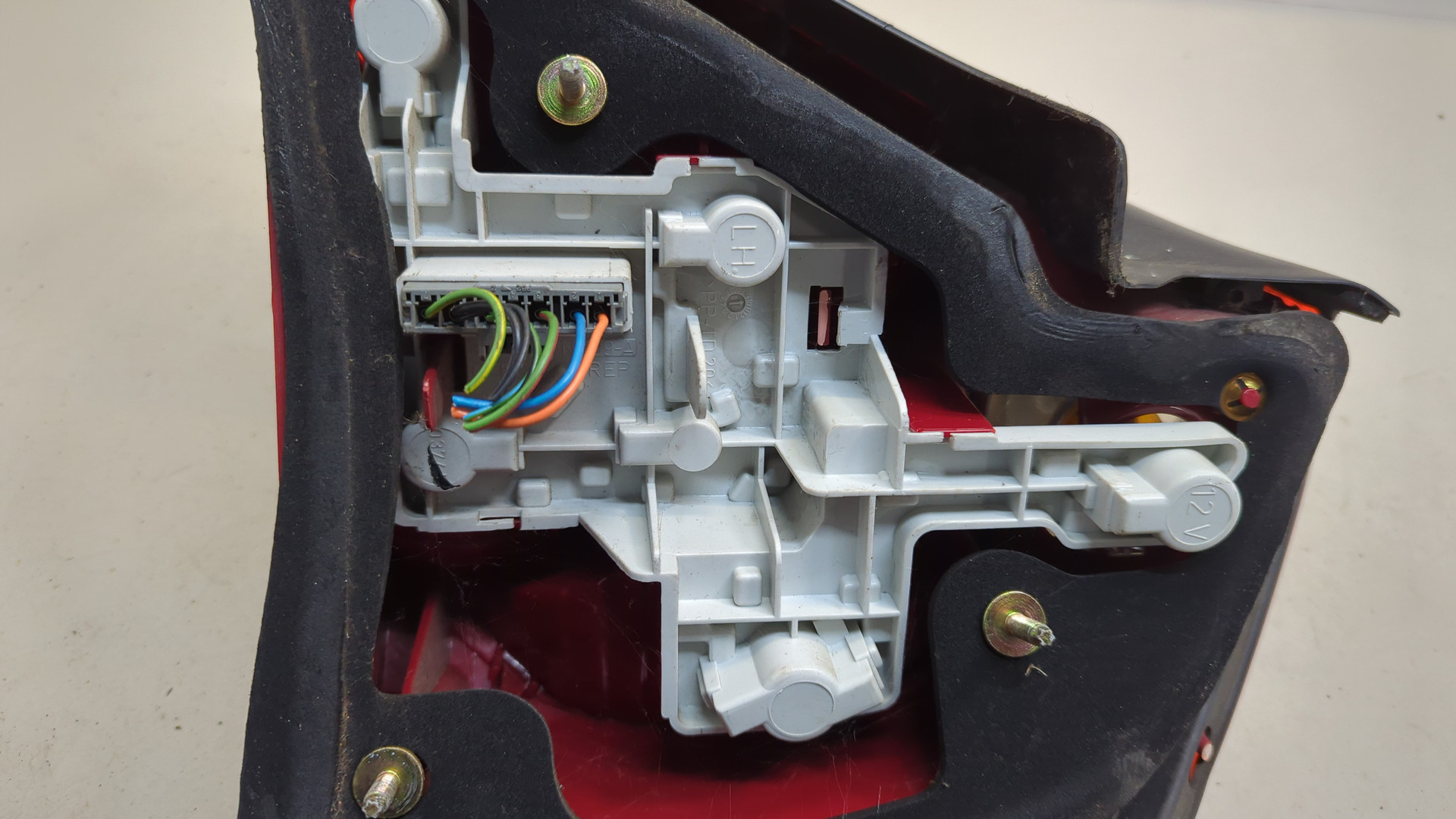 Фонарь задний левый