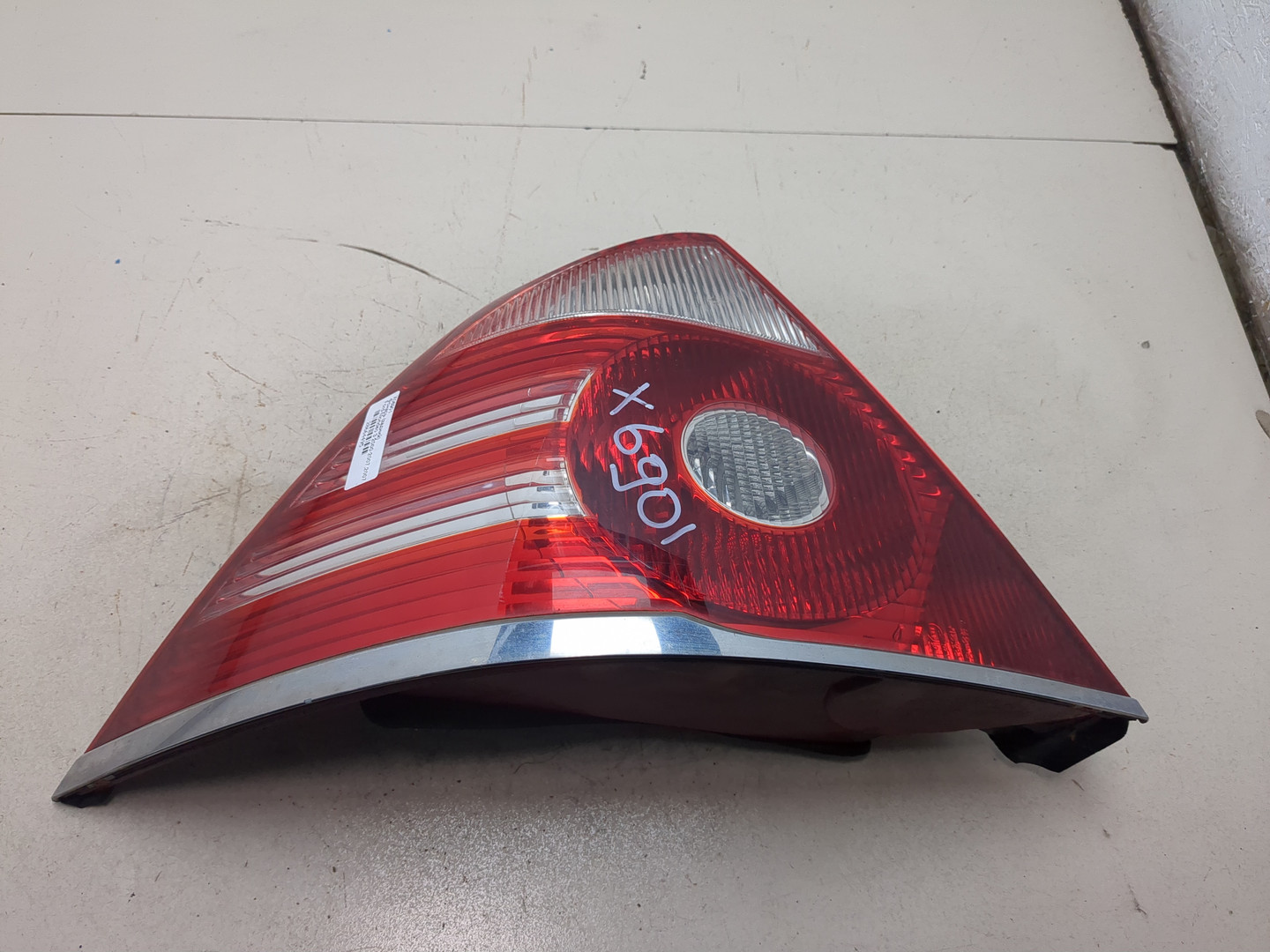 Фонарь задний левый